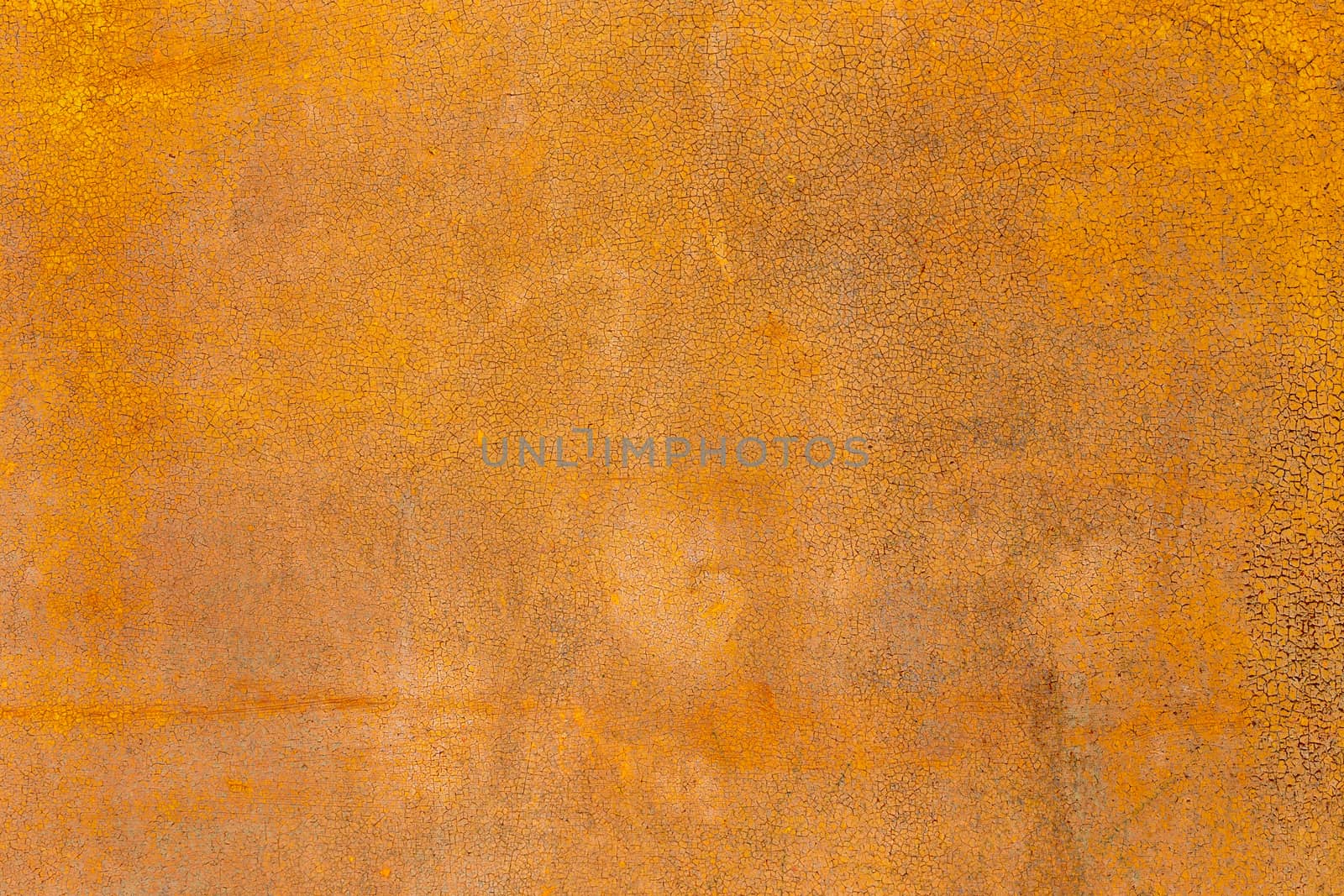 fine-grained craquelures and rust on old painted flat surface