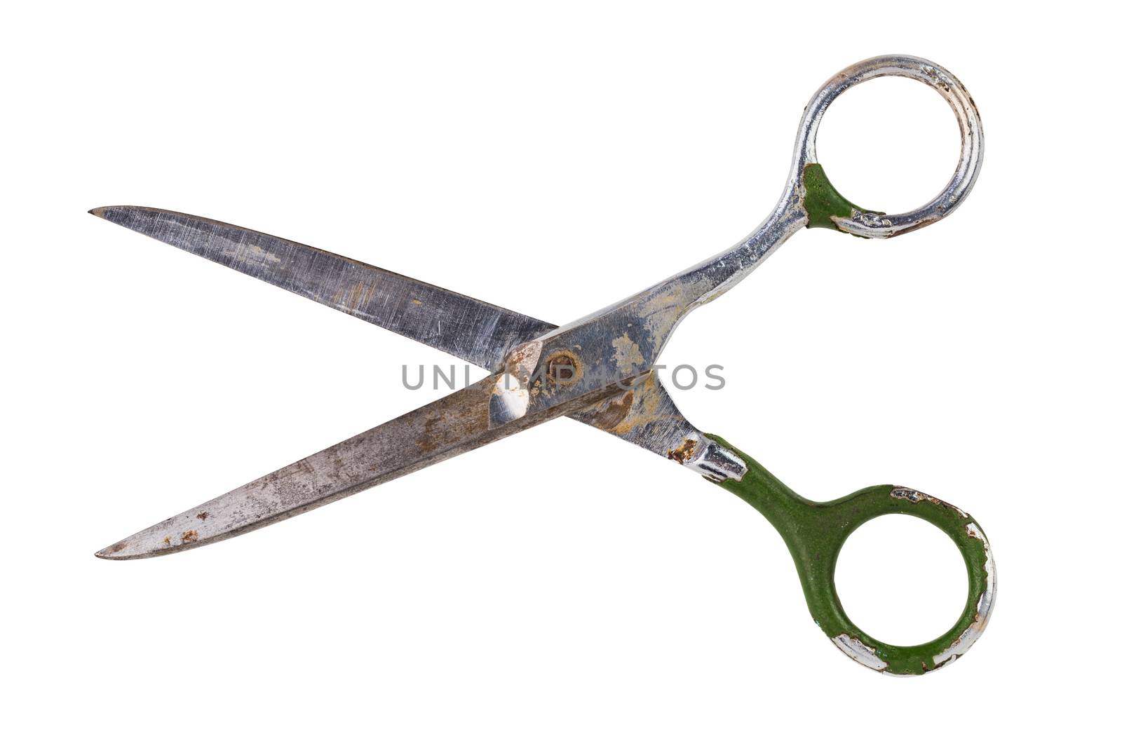Single old soviet dirty used scissors isolated on white background. Opened.