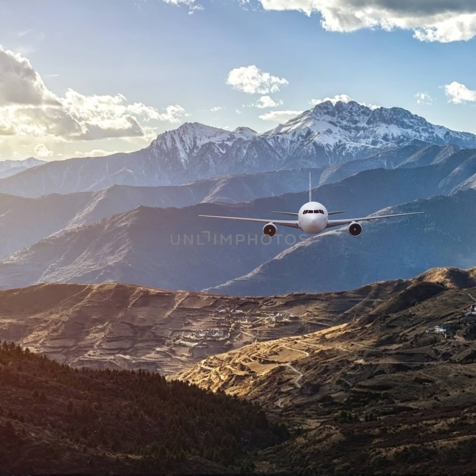 Airplane frying over the Snow Mountain background