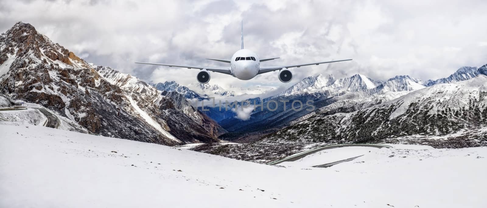 Airplane frying over the Snow Mountain background by Surasak