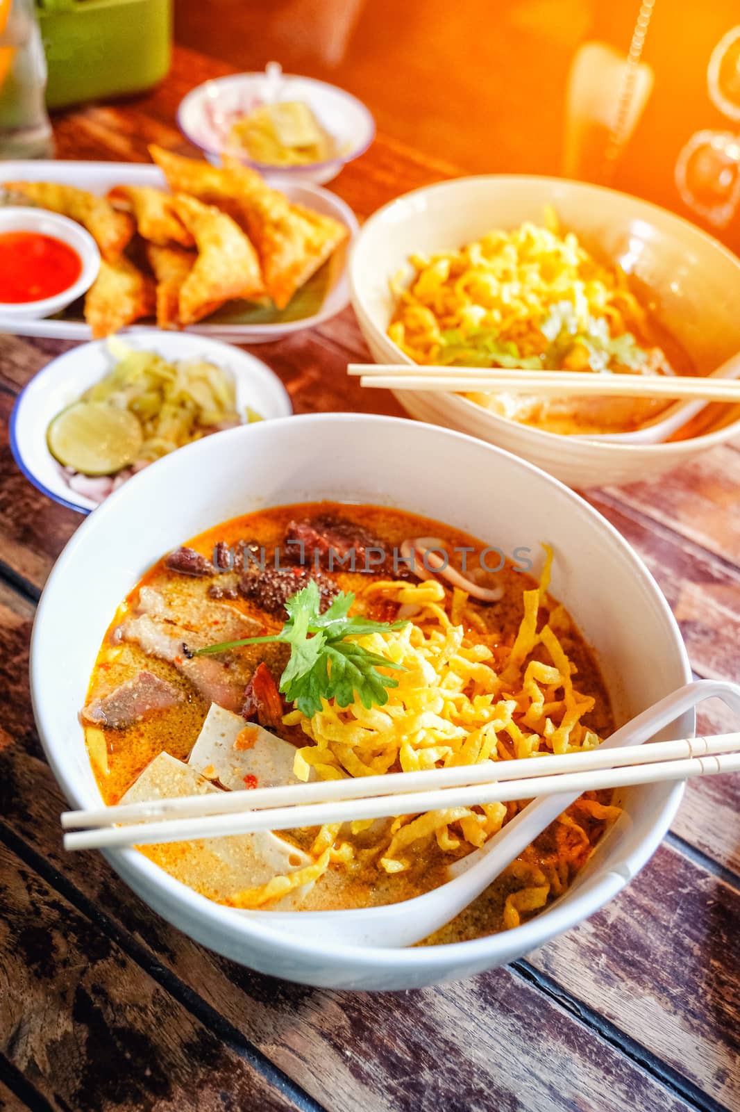 Northern Thai  Curried noodle soup (Khao soi) with chicken meat and spicy coconut milk 