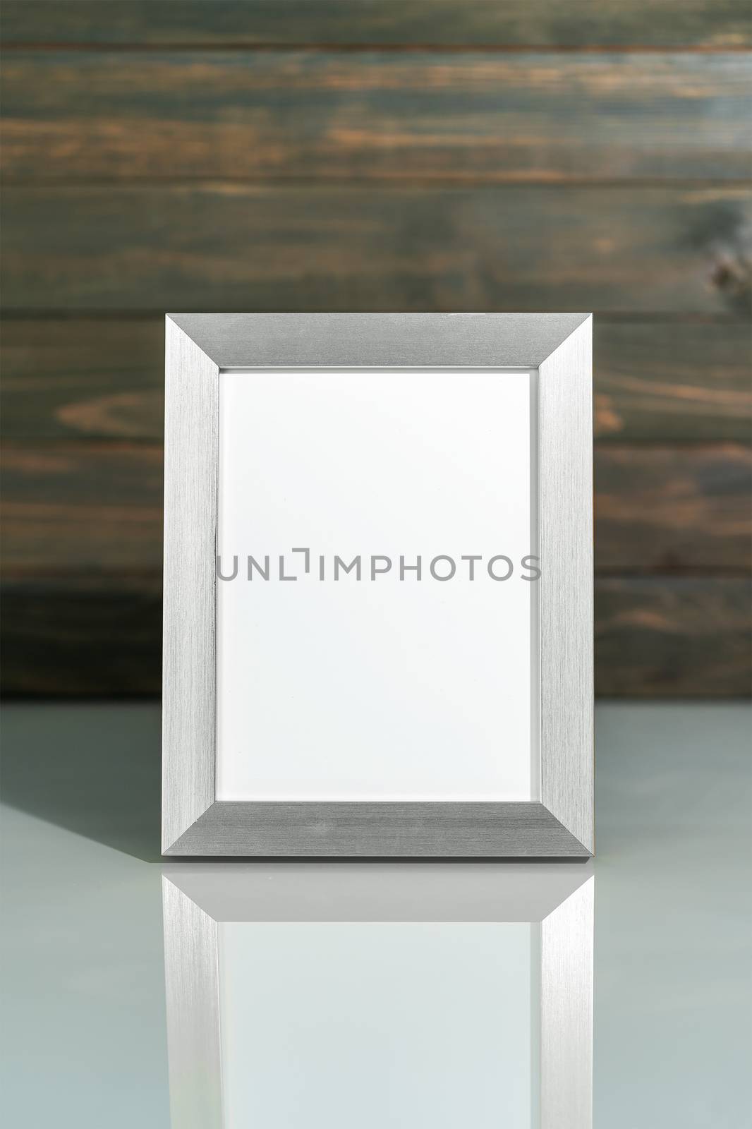 Picture silver frame mock up on table  by stoonn