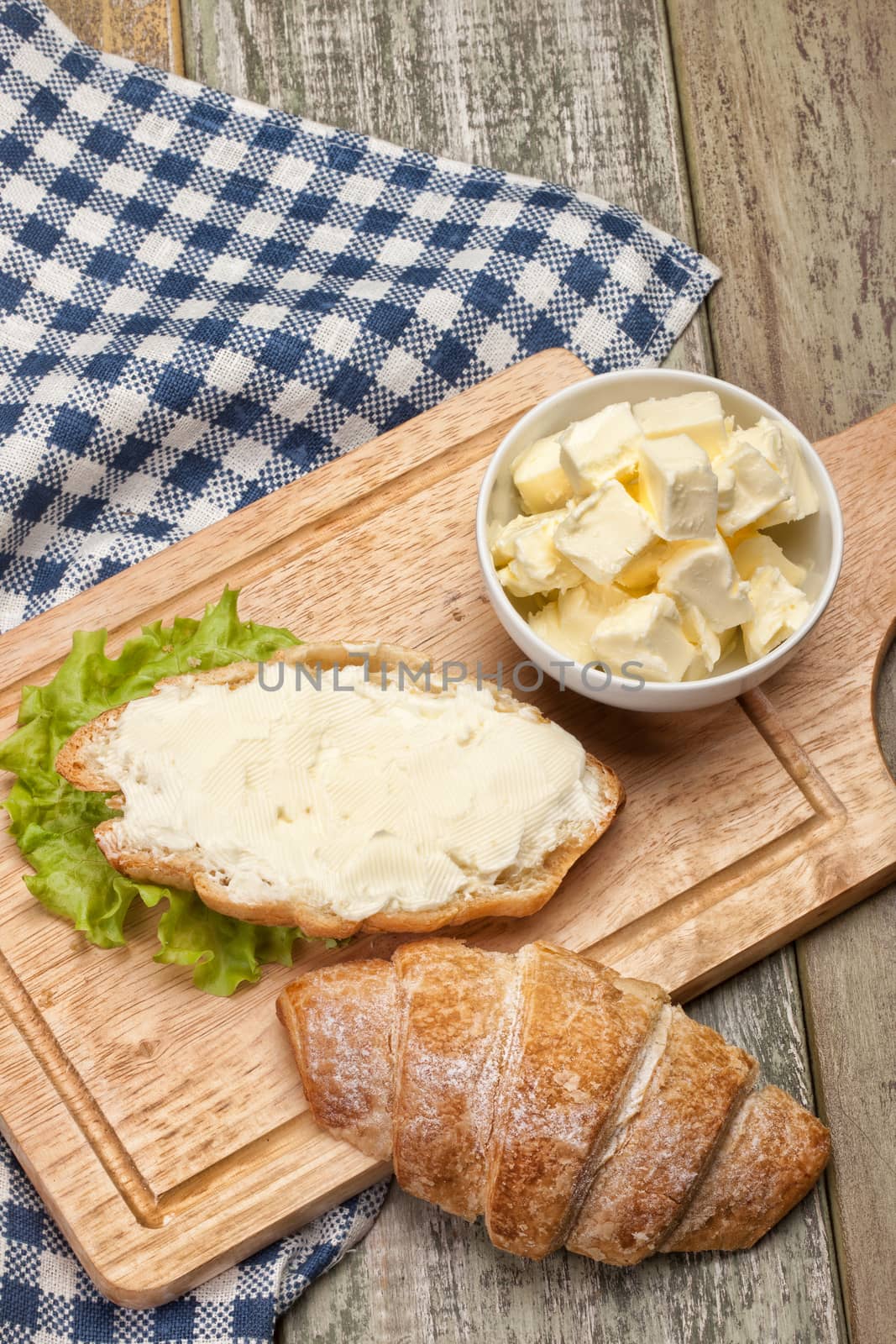 Bread and butter on a canvas studio background