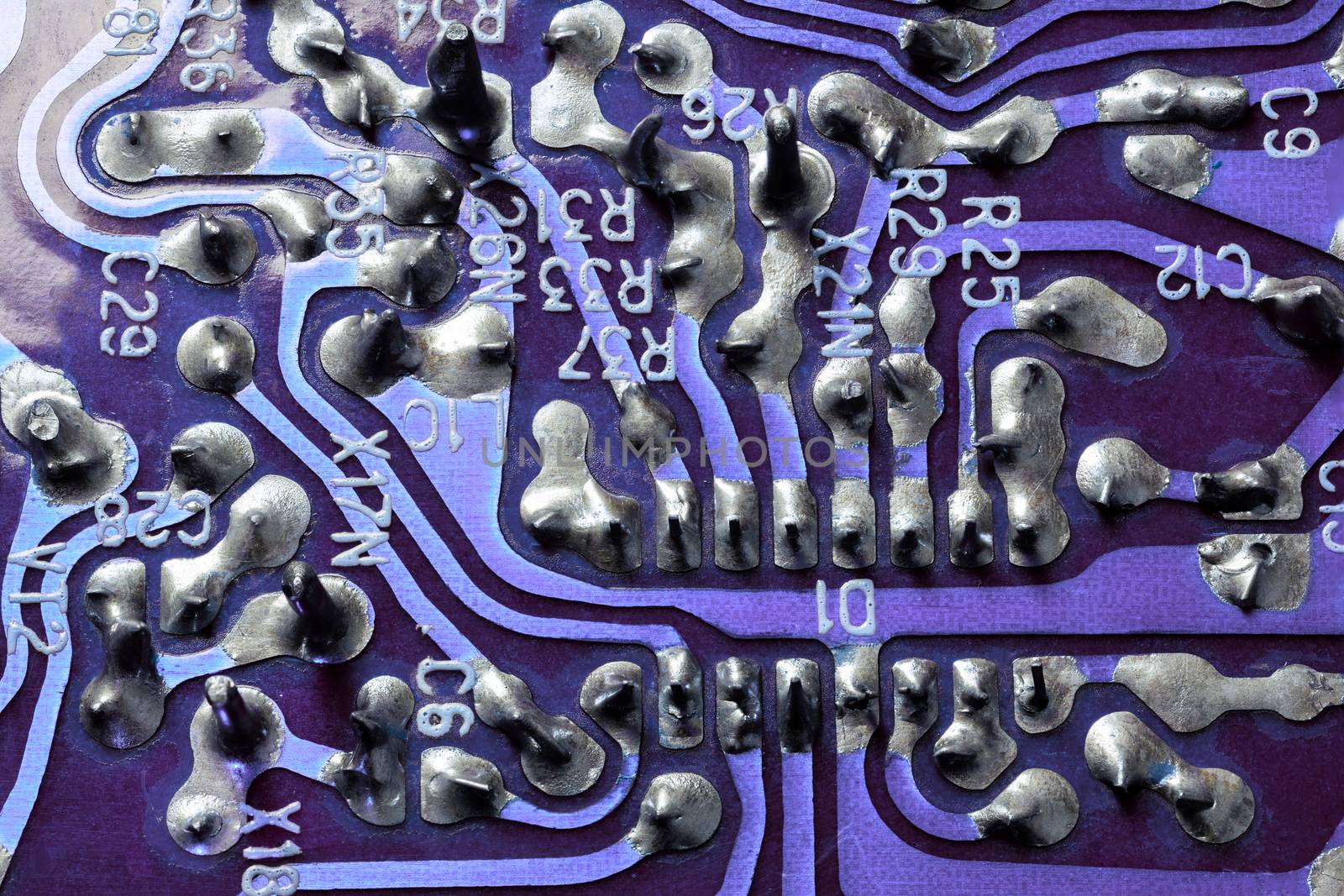 back side of old flat textolite pcb without components with selective focus