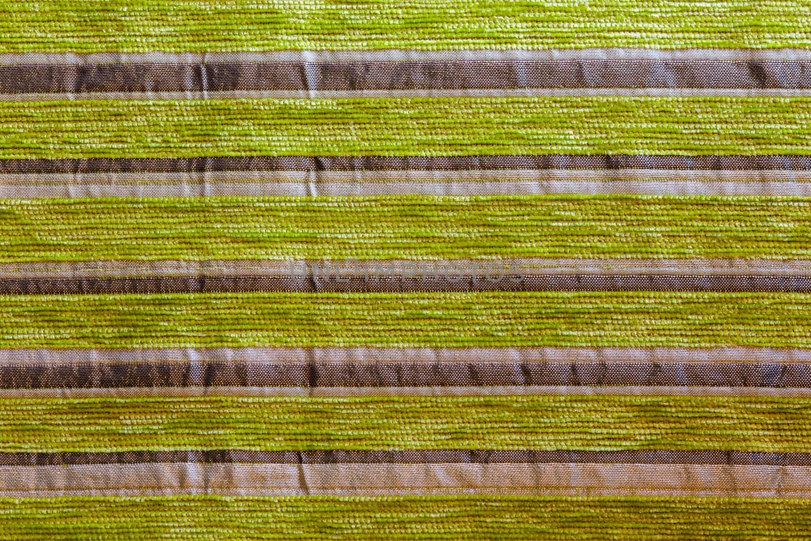 green striped synthetic woven upholstery fabric close-up texture and background