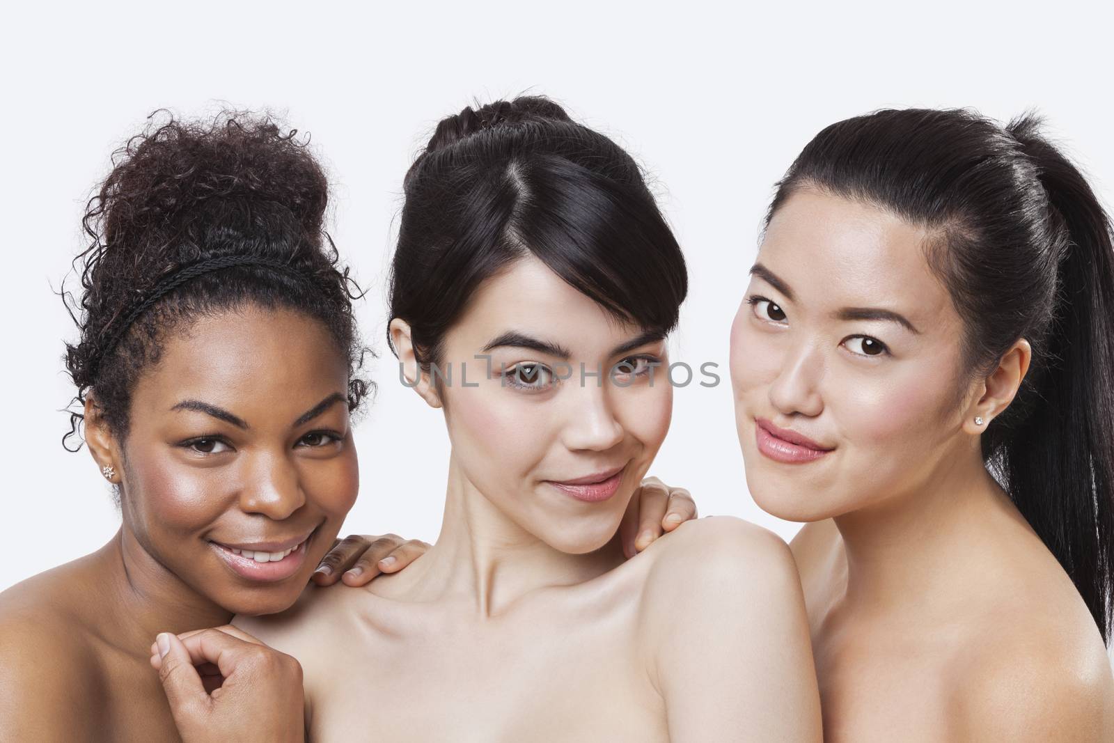 Beauty portrait of young multi-ethnic women over white background by moodboard