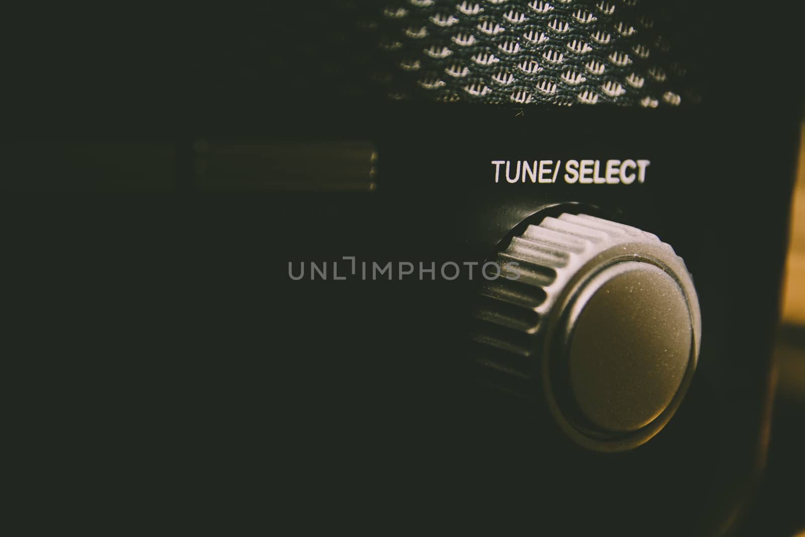 Tune Select button on a vintage and retro analogue radio. by kb79