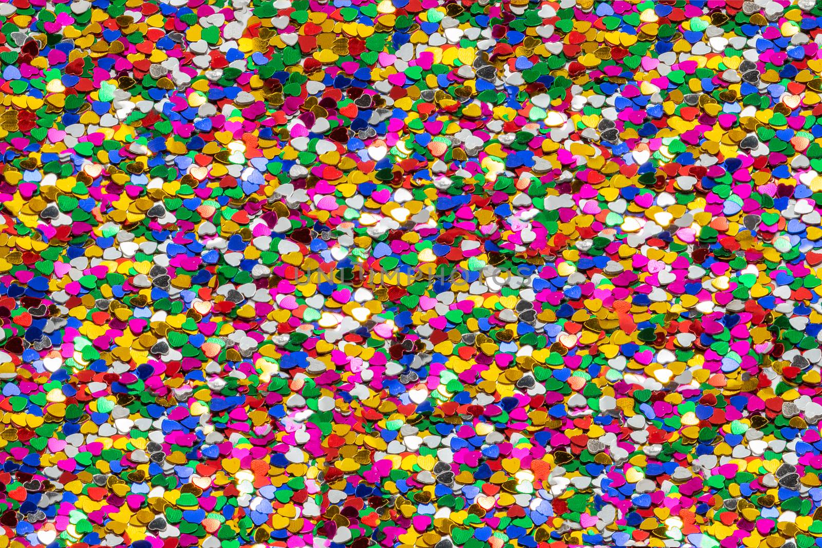 Multi-colored background made of tiny colorful hearts symbolizing love and diversity. Valentines Day Theme