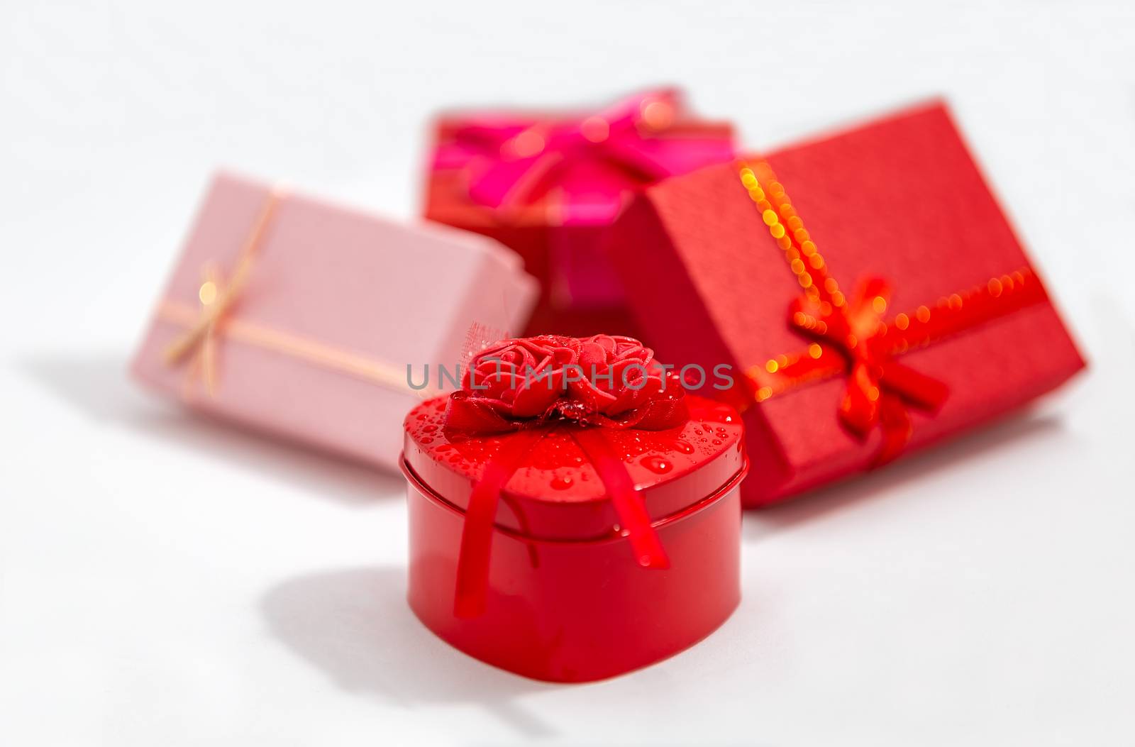 Front View of a Bunch of Colorful Gift Boxes by DamantisZ