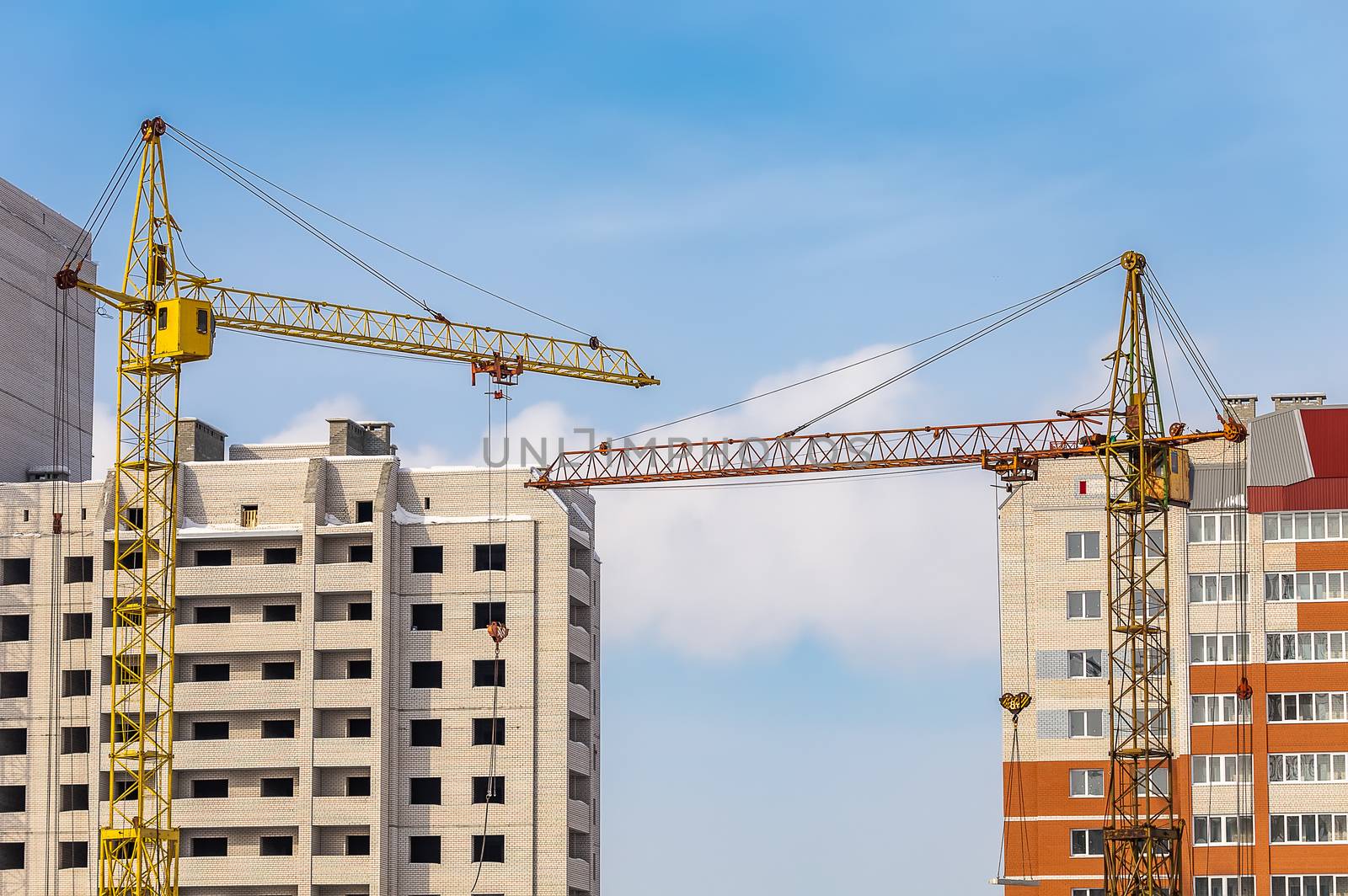 Construction Site with Two Buildings and Cranes by DamantisZ