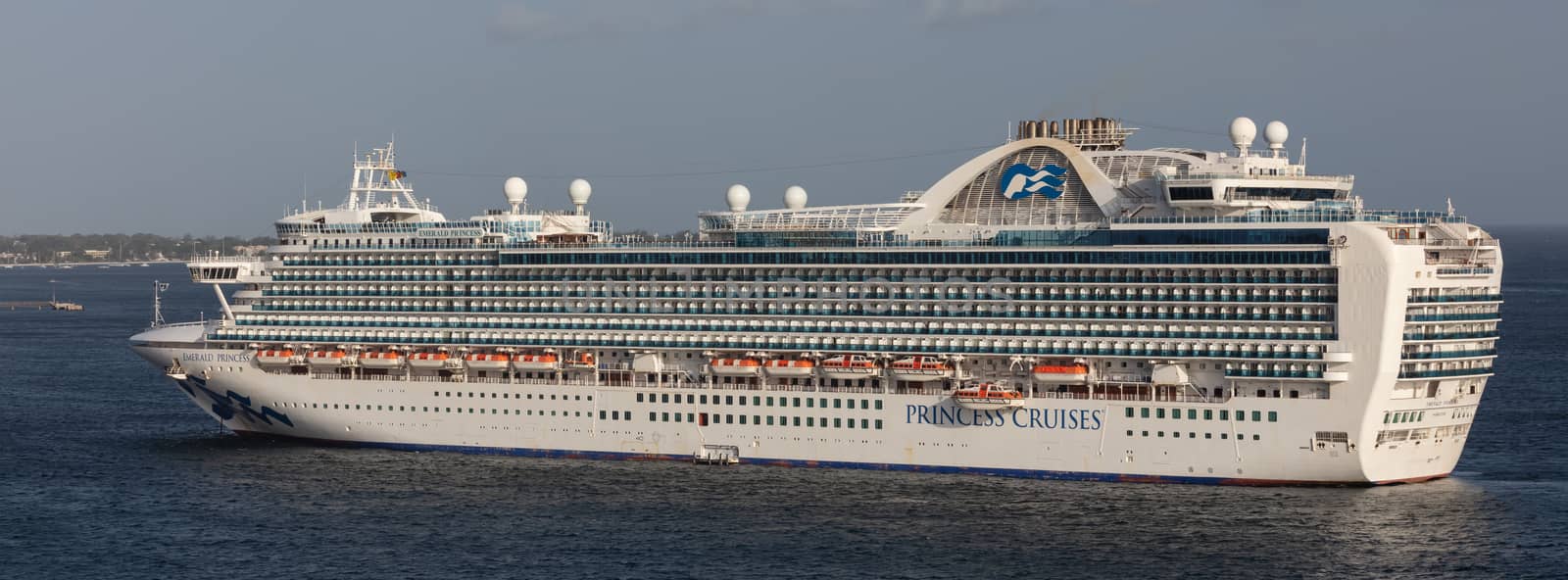 Carlisle Bay, Barbados, West Indies - May 16, 2020: Emerald Princess cruise ship anchored next to Barbados