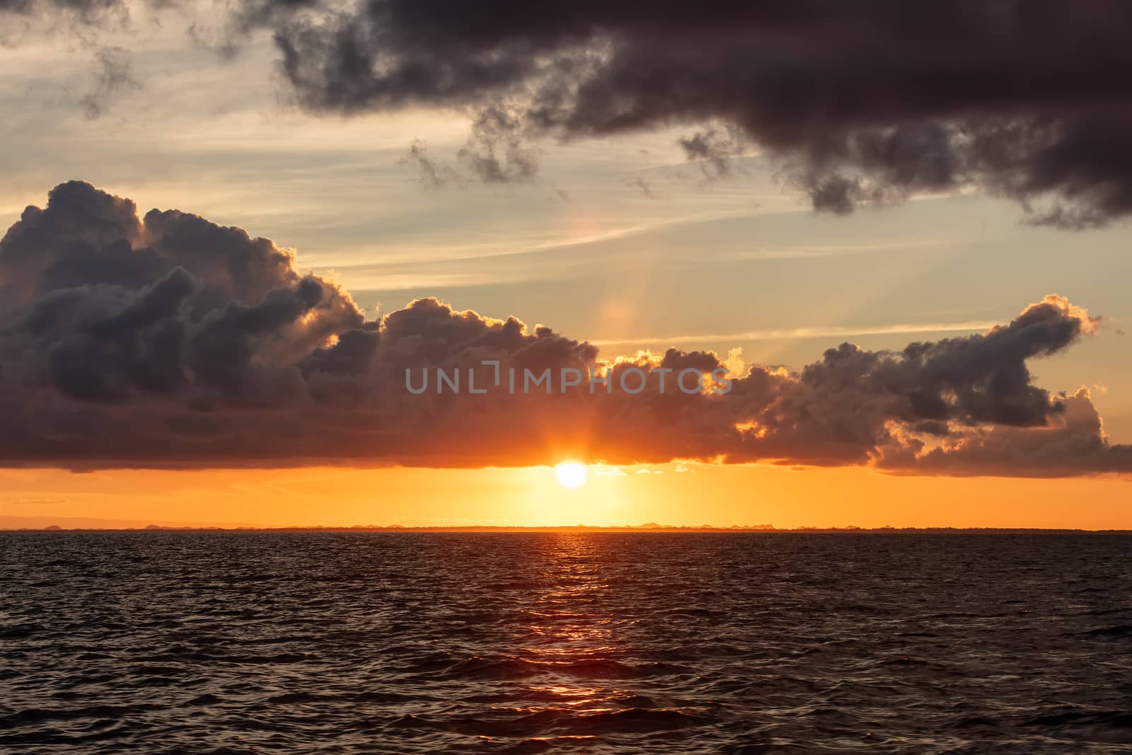 Beautiful sunset by the coast of Belize