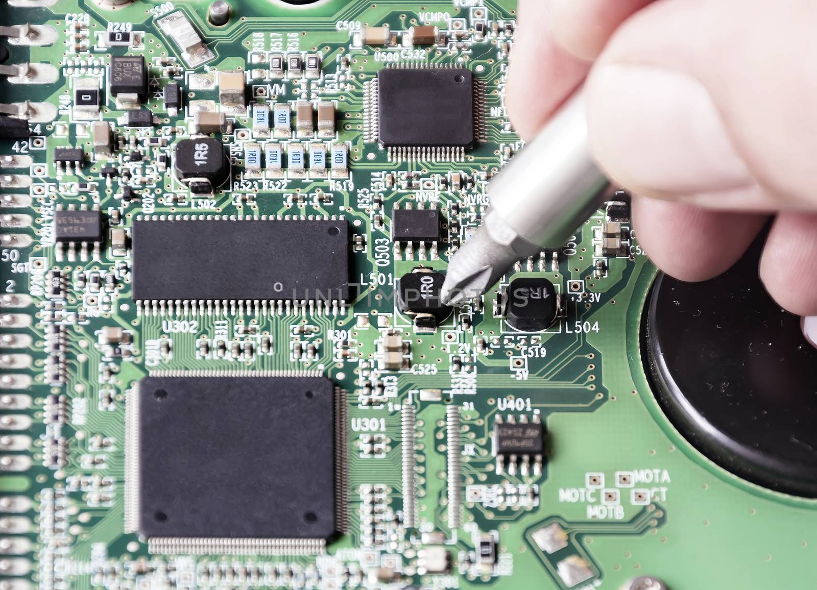 repairing a printed circuit board. Micro technology and repairs. Electronic components and conductors