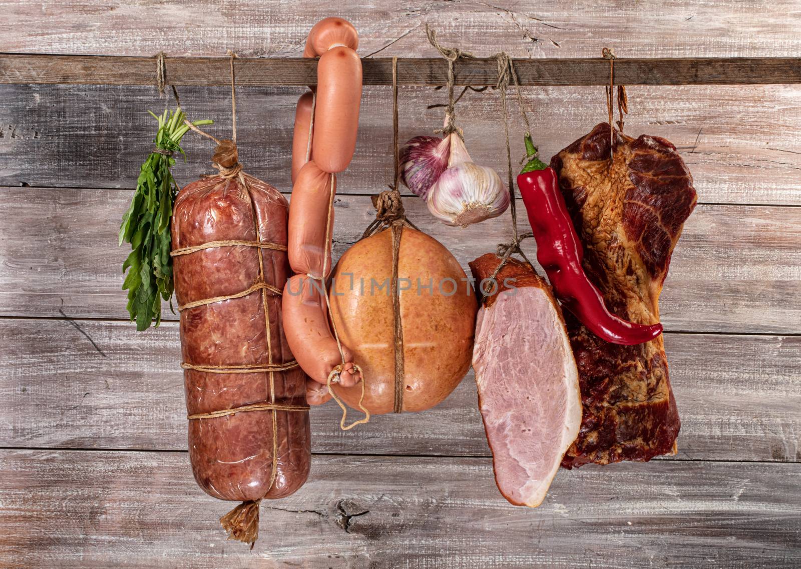 Different kinds of vegetables on a wooden studio background