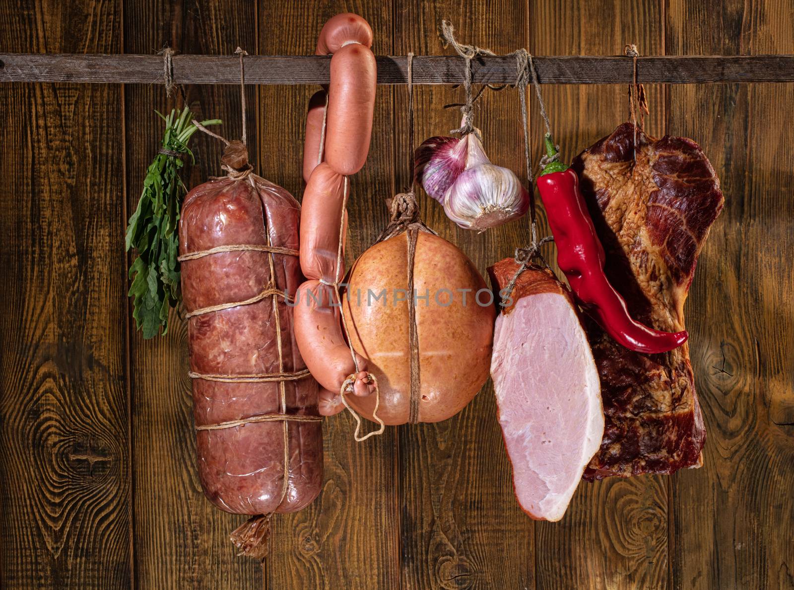 Different kinds of vegetables on a wooden studio background