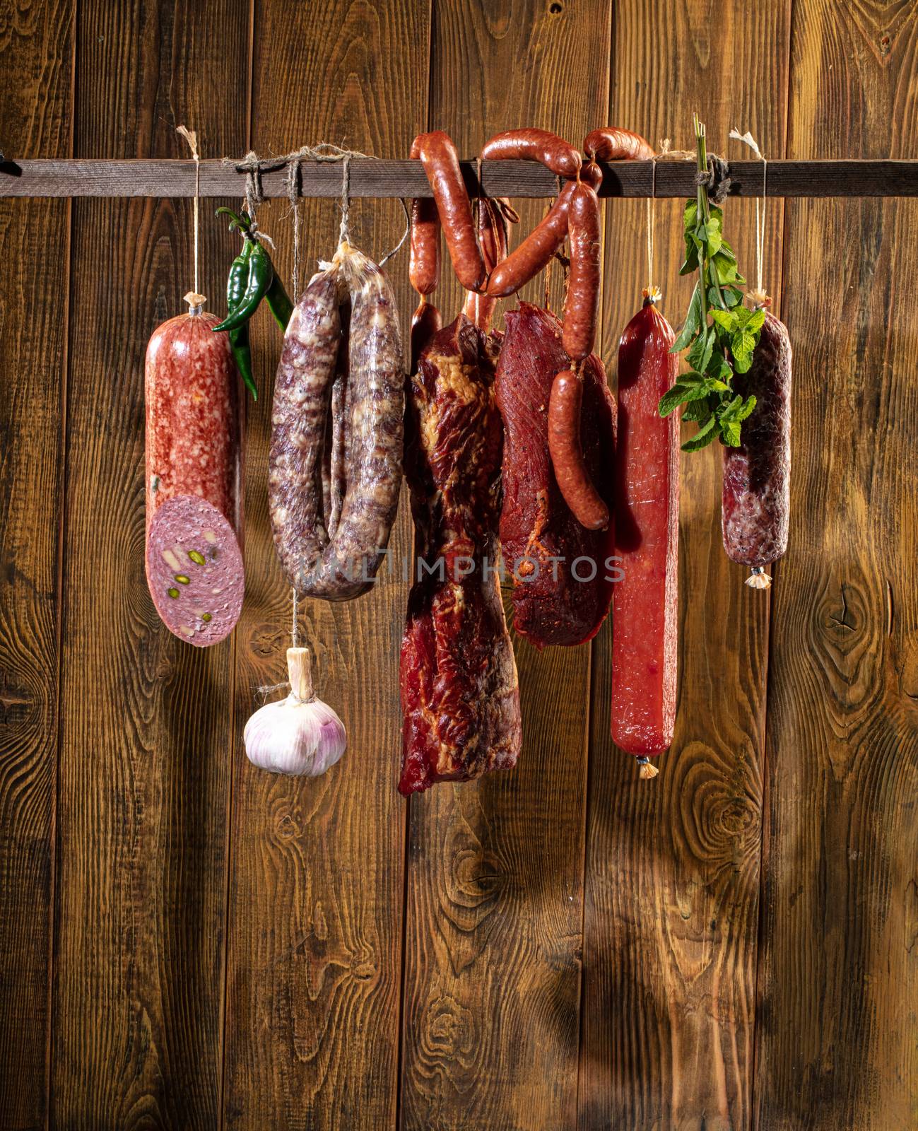 Different kinds of vegetables on a wooden studio background