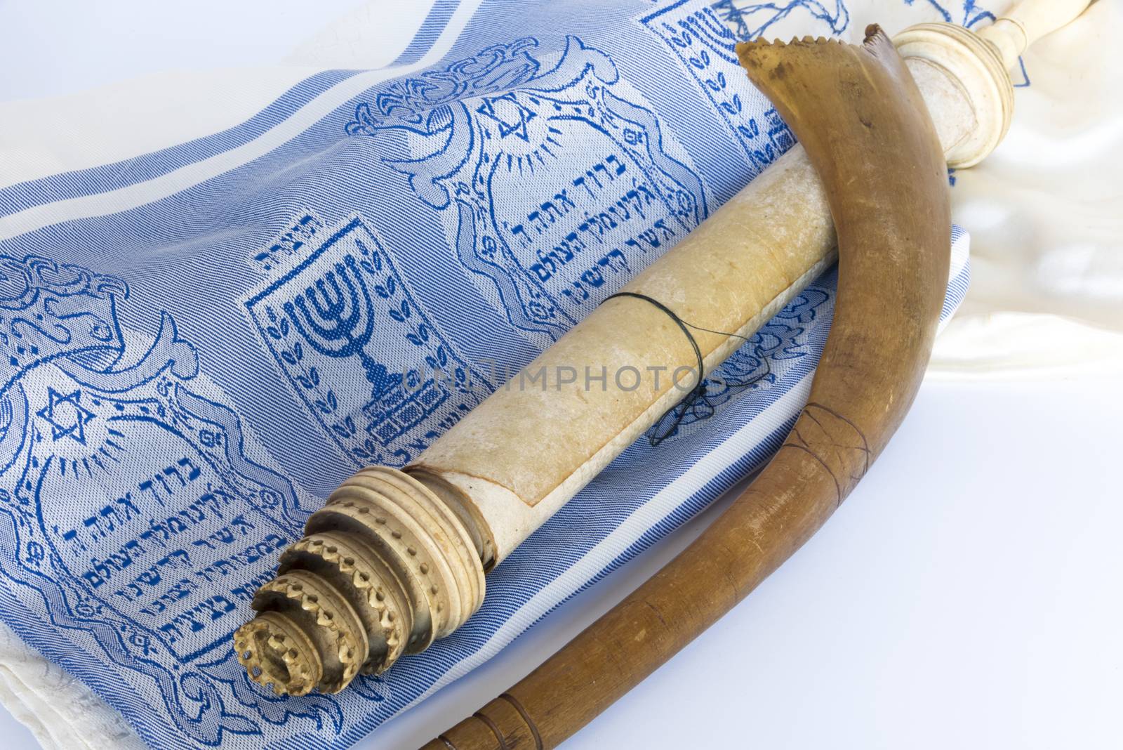 Rosh Hashanah Hashana jewish New Year holiday and Yom Kippur concept with Ram shofar horn ,Rolled Parchment Scroll, Tallit. High quality photo