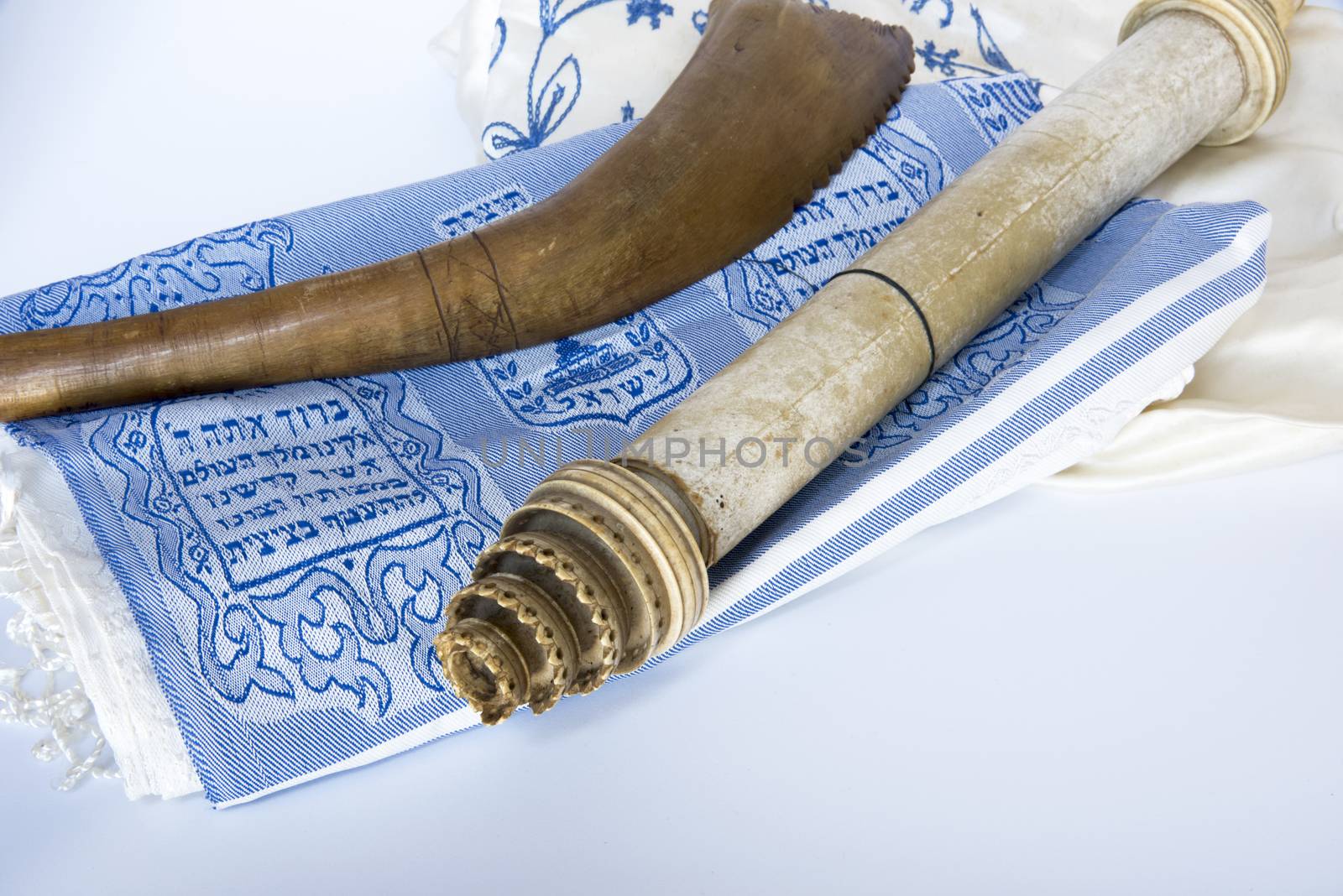 Rosh Hashanah Hashana jewish New Year holiday and Yom Kippur concept with Ram shofar horn ,Rolled Parchment Scroll, Tallit. High quality photo