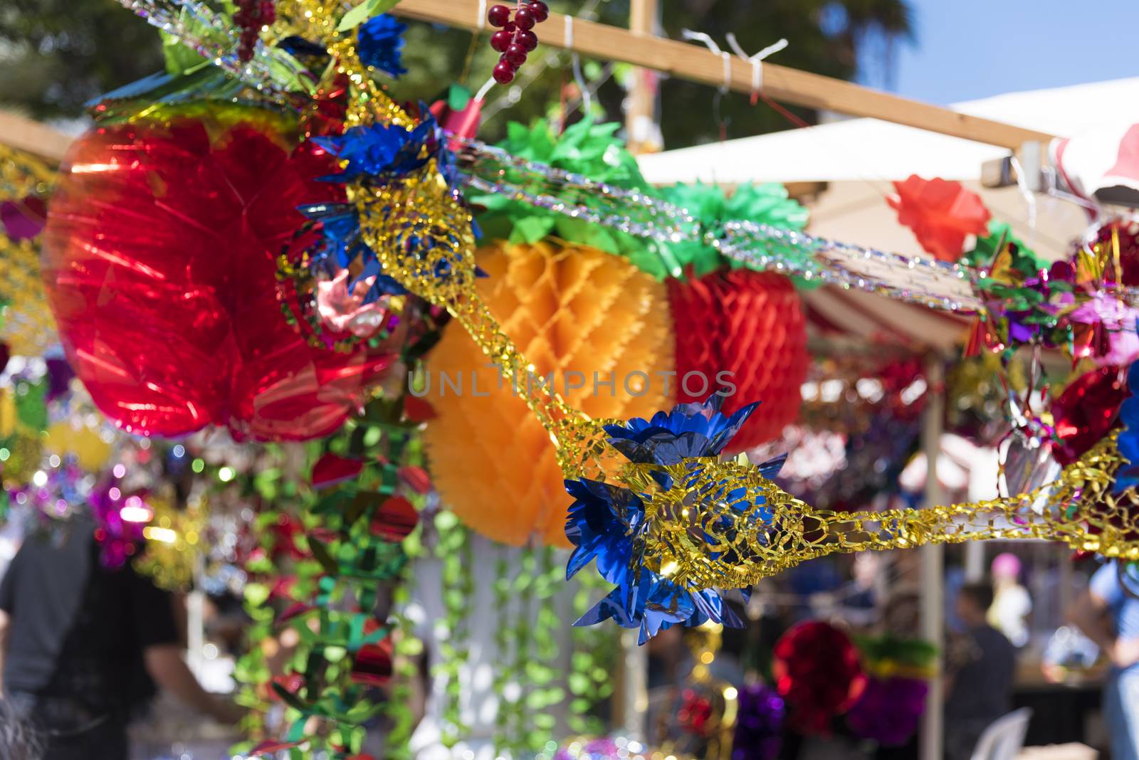 Colorful sukkah decorations. Sukkot four species festival. Shimmering decorations for party.