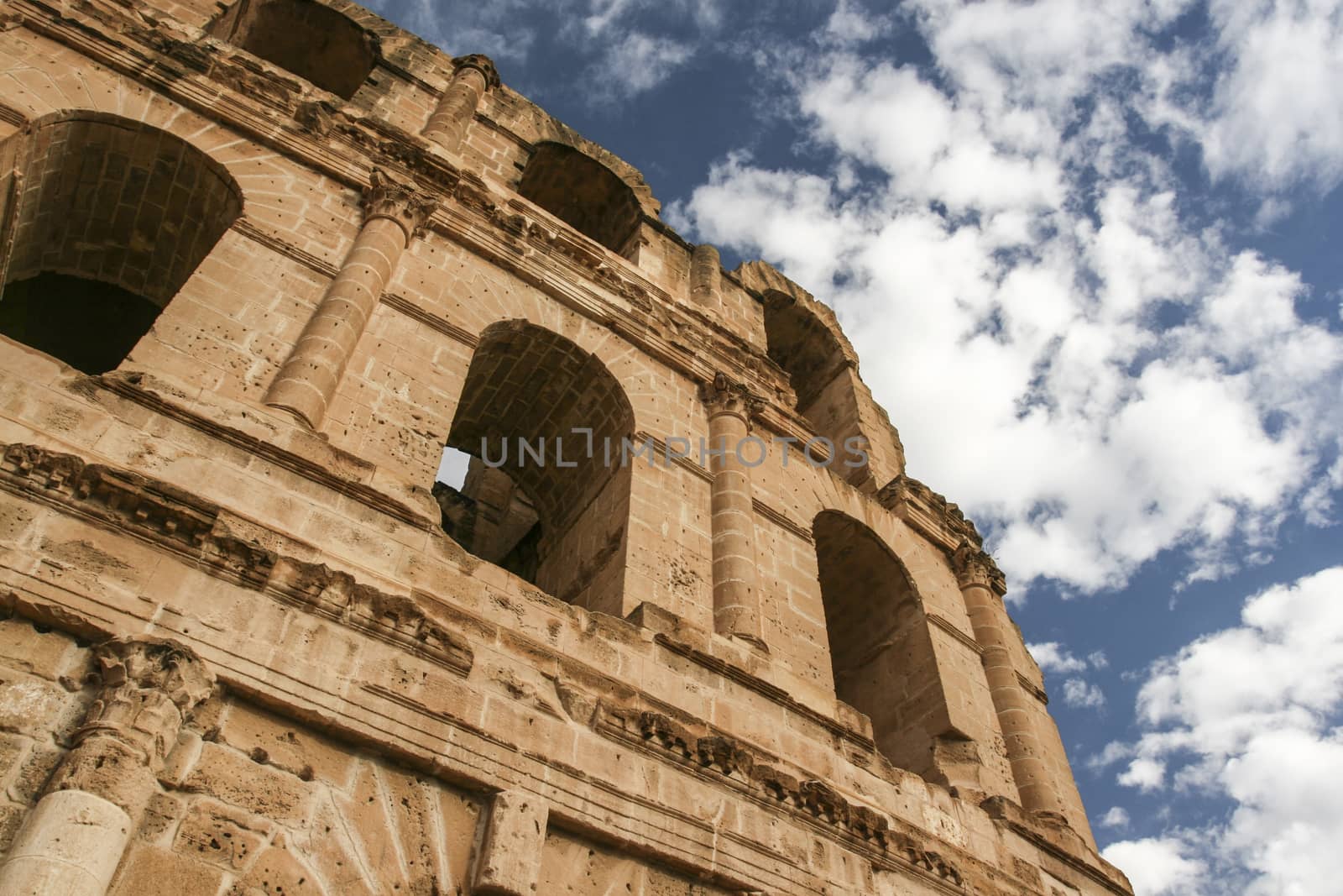 View on arched windows of ancient El Jem colloseum (also called  by Ivanko