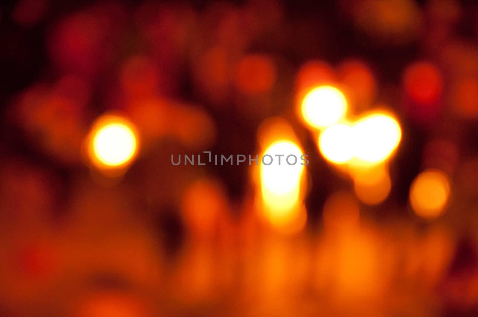 Defocused abstract festive red light background by eyeofpaul