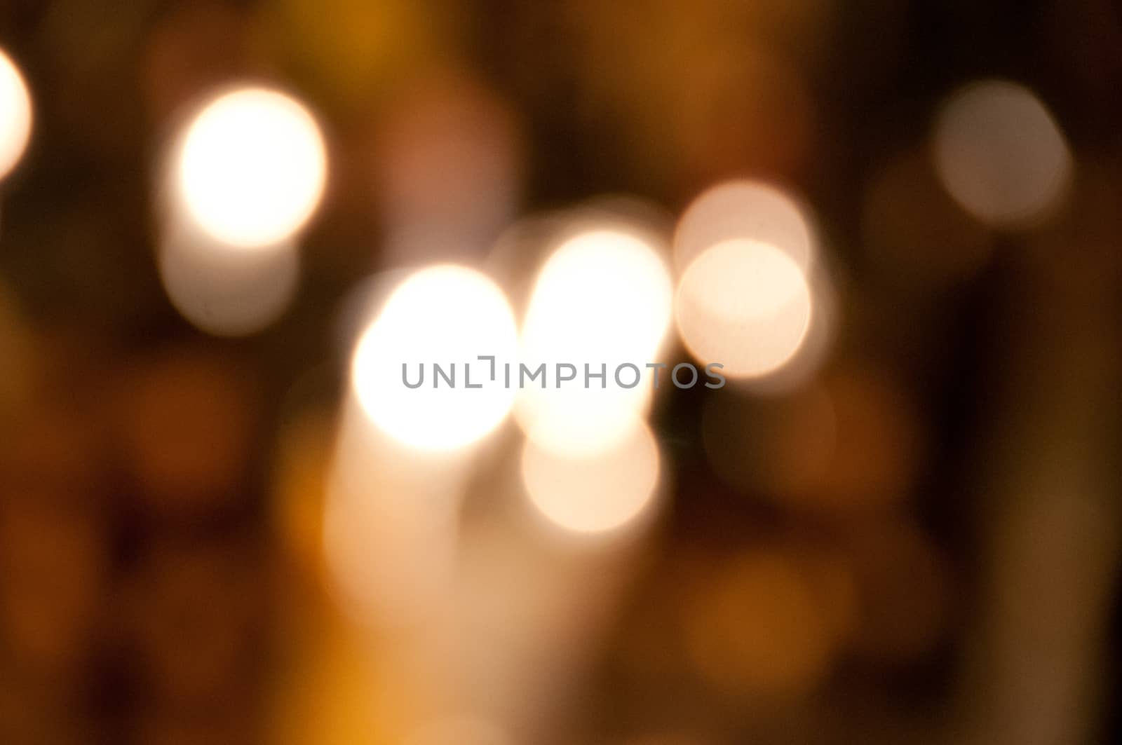 Defocused light bokeh festive background by eyeofpaul