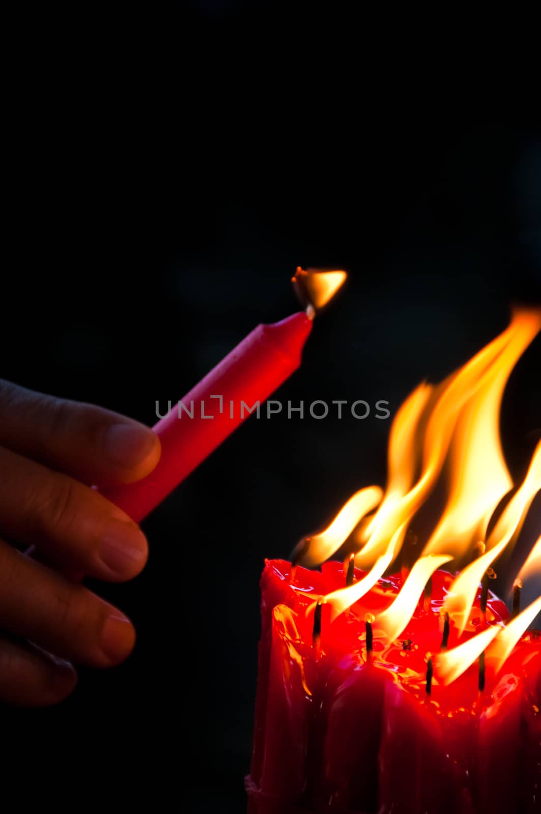 Light up bright red candle by eyeofpaul