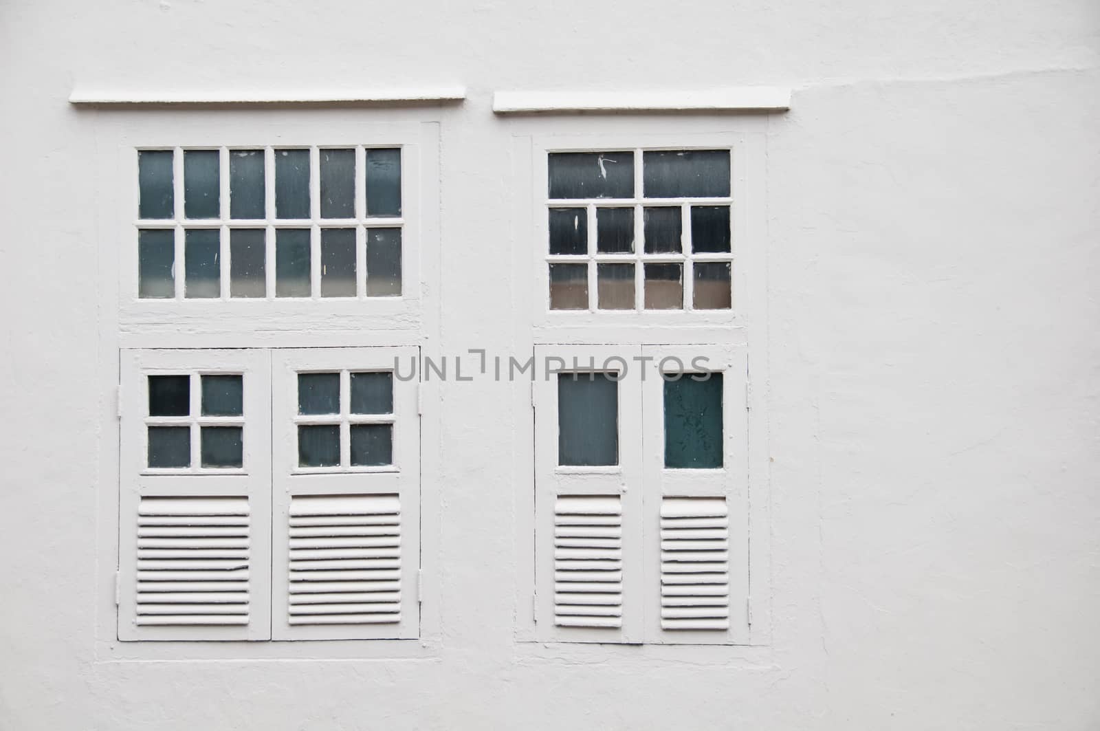 White classic window on white wall