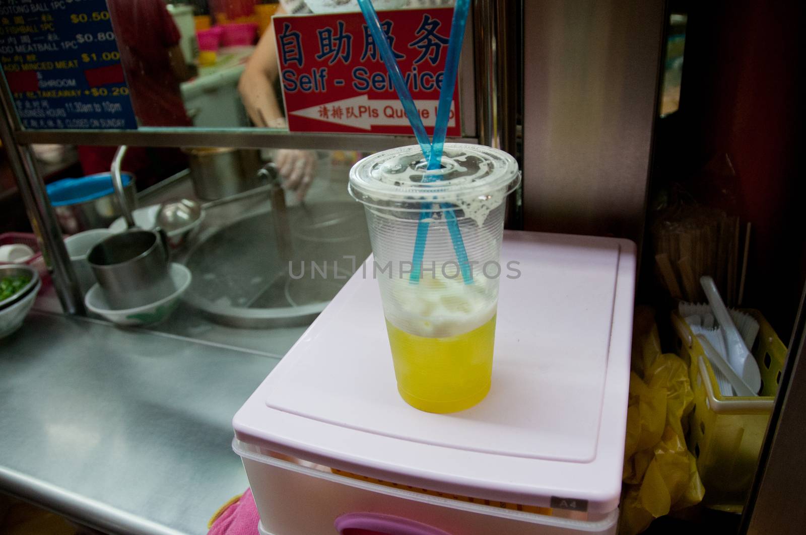 Sugarcane cold drink in Singapore hawker center