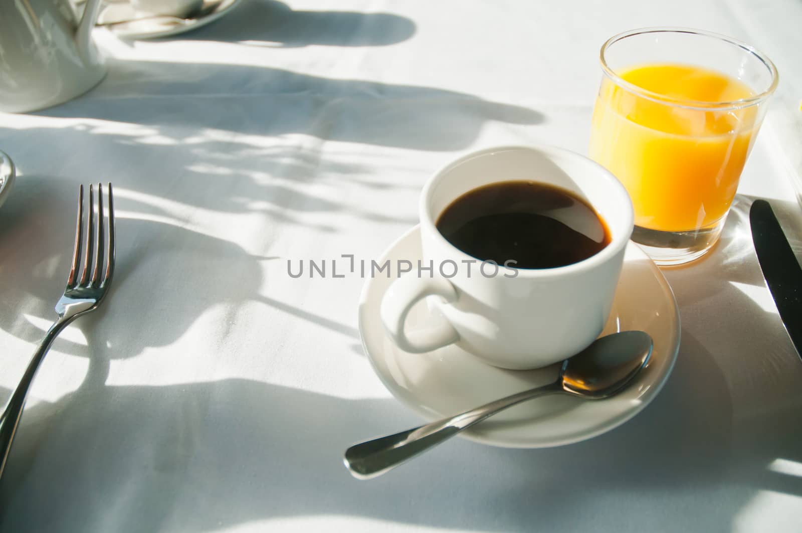 Coffee and Orange juice for breakfast in hotel by eyeofpaul