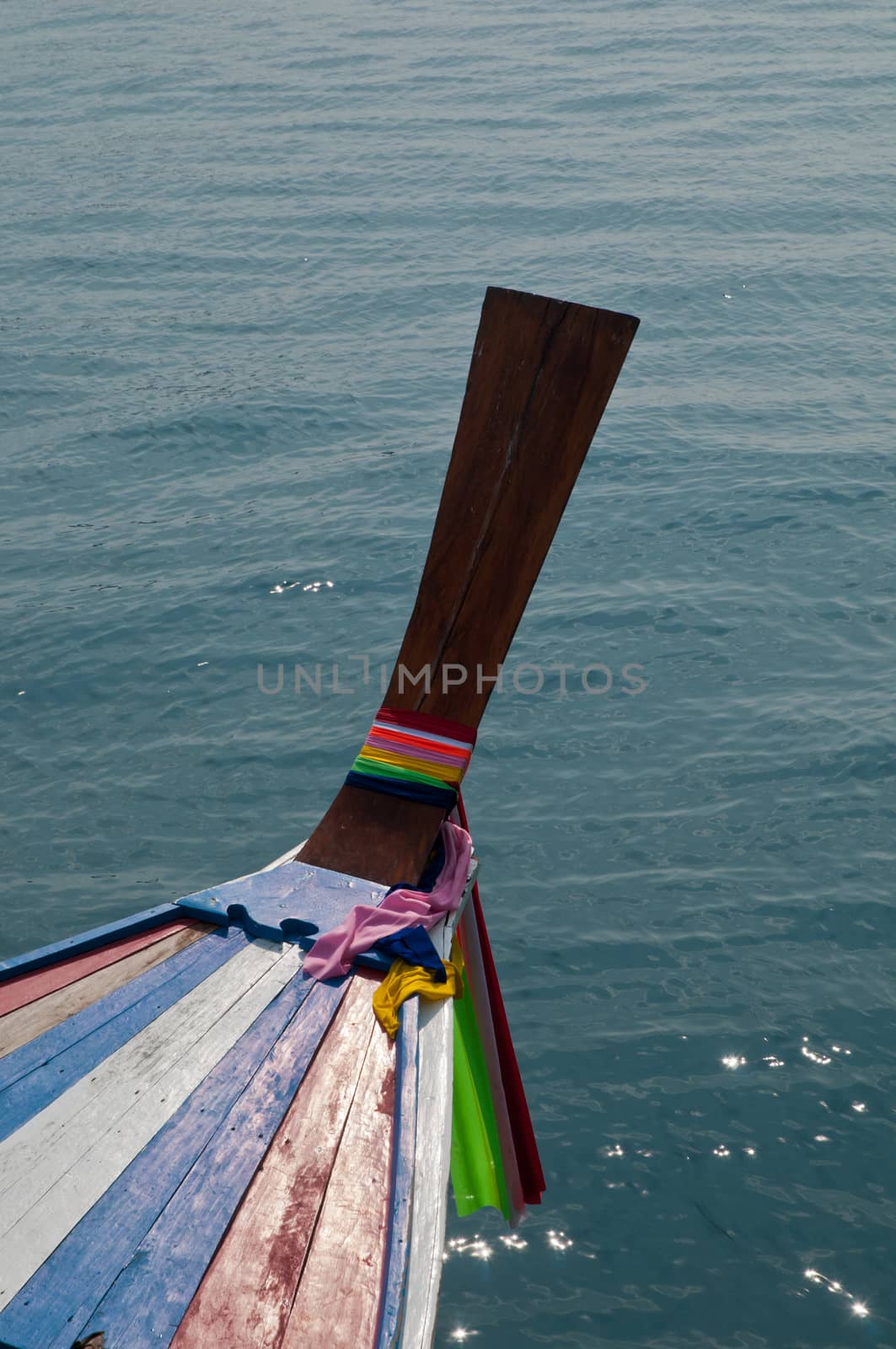 Colourful sacred strip of sea boat in Phuket by eyeofpaul