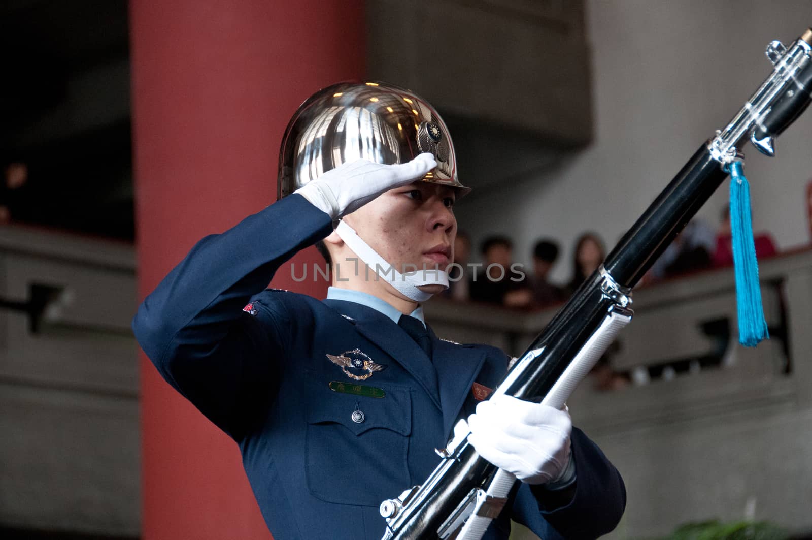 Soldier salutes at Sun Yat Sen Memorial hall in Taiwan