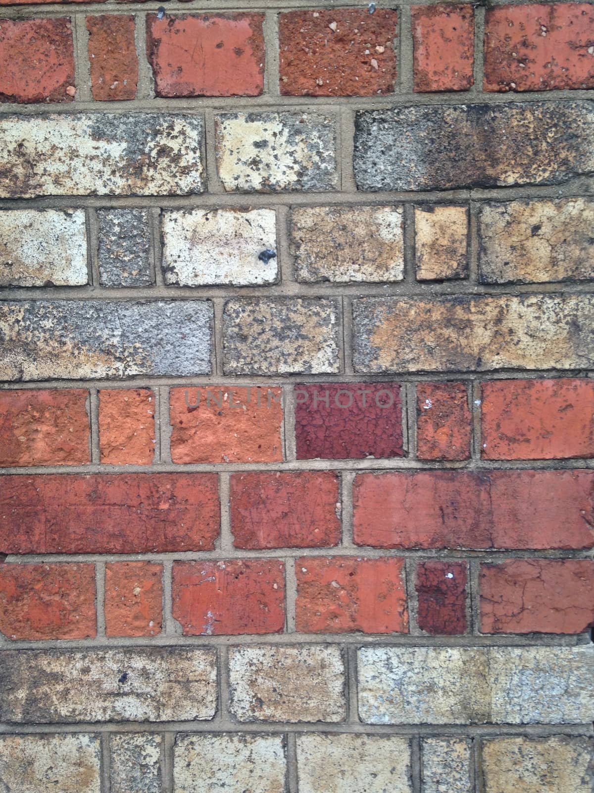 Dirty red brick wall by eyeofpaul