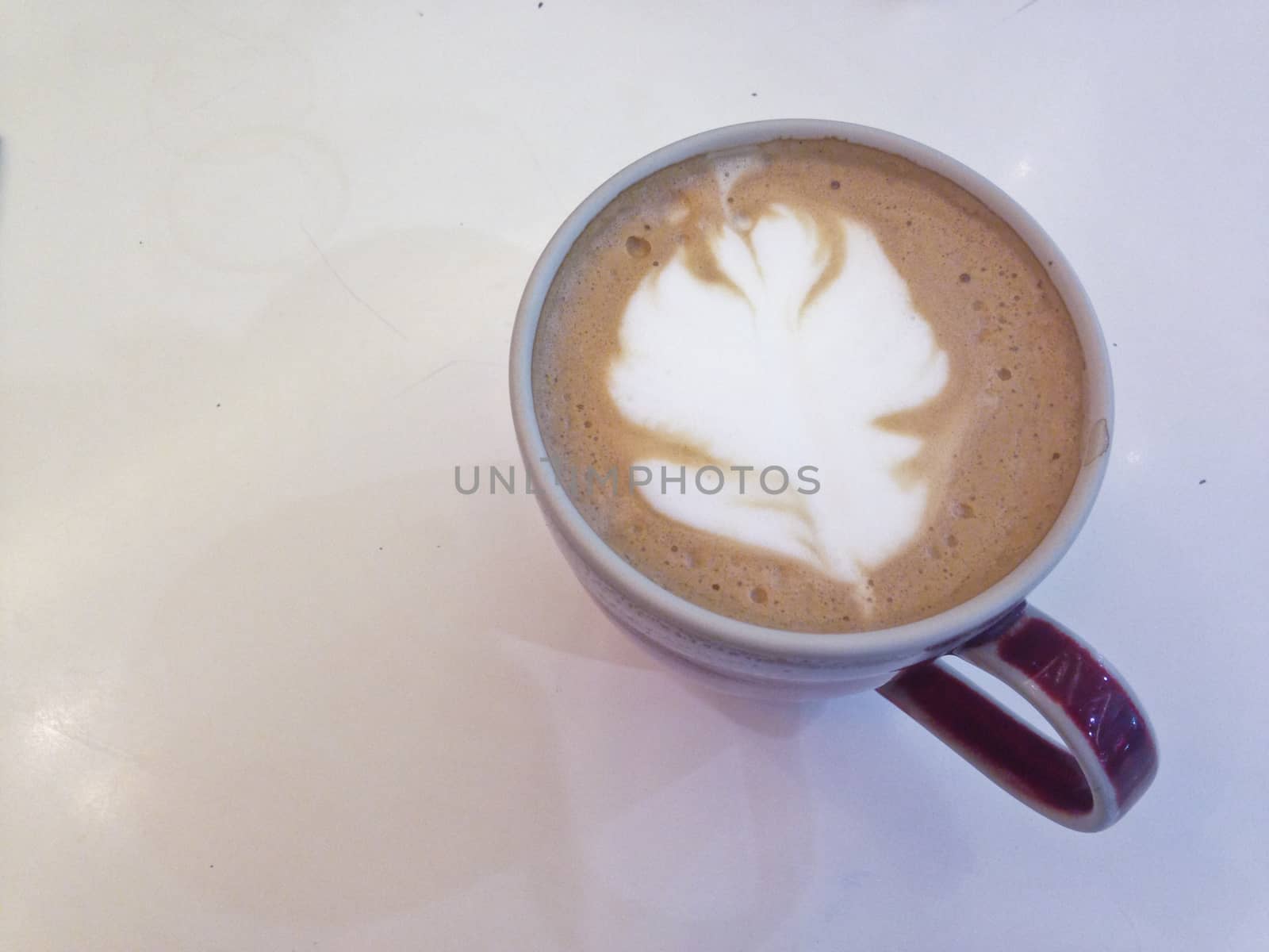 Hot coffee latte art in a cup