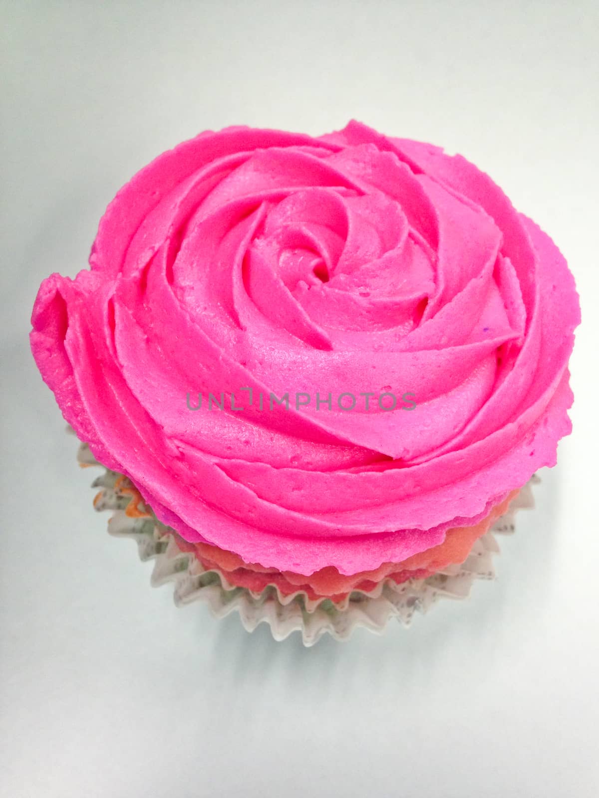 Top view of pink rose cup cake