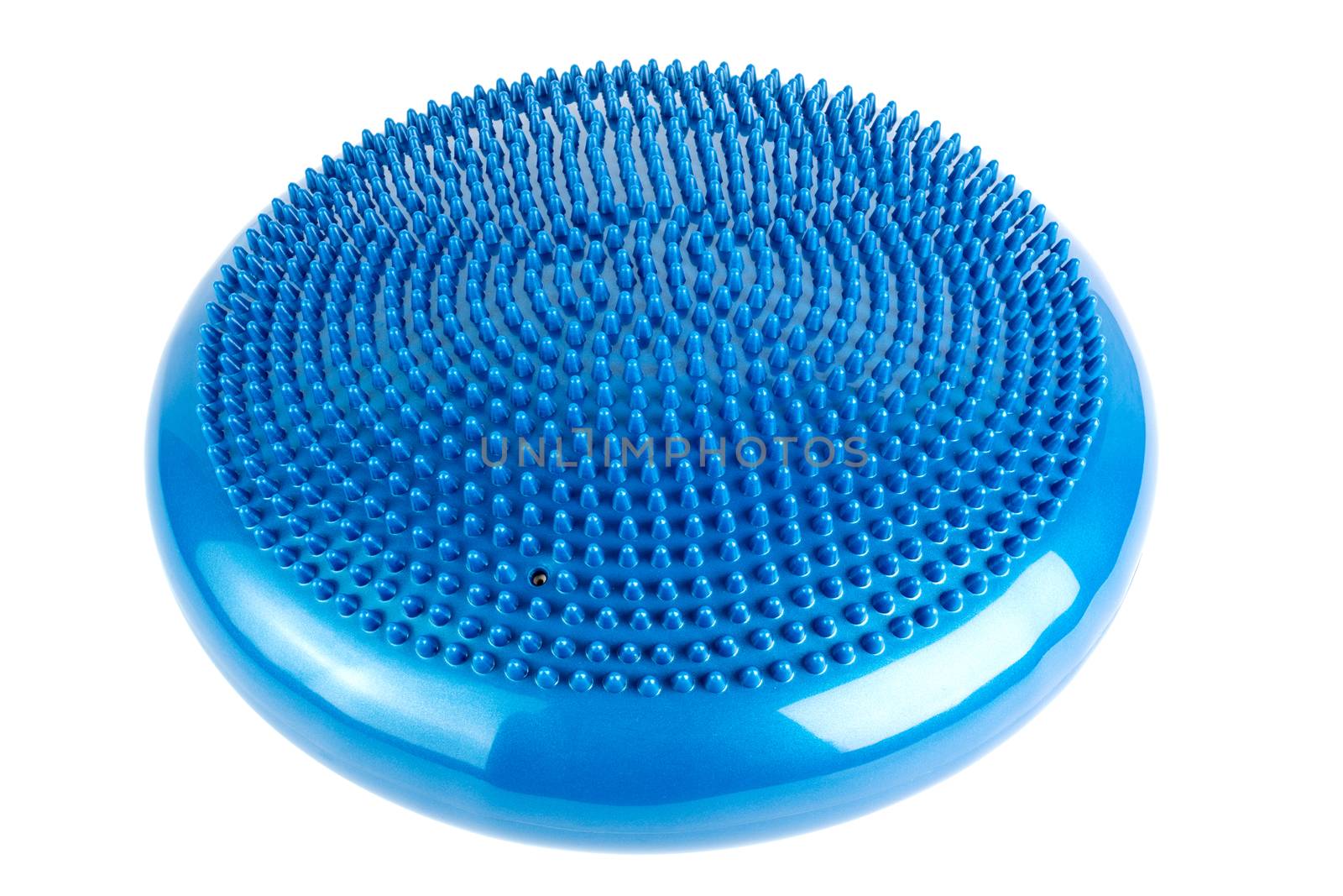 Blue inflatable balance disk isoleated on white background. A balance disk is a cushion can be used in fitness training as the base for core, balance, and stretching exercises. It is also known as a stability disc, wobble disc, and balance cushion.