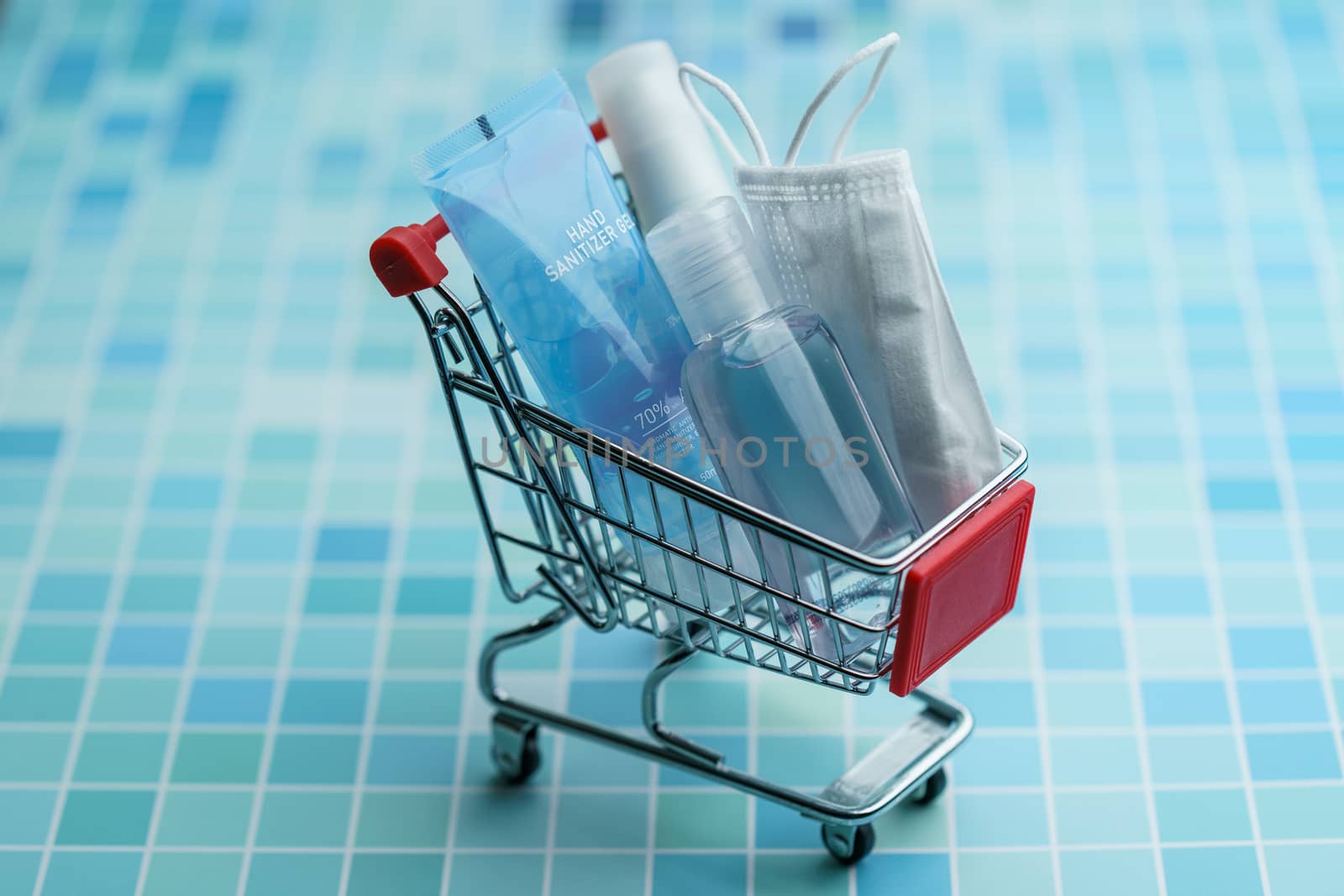 Shopping cart with must have items hand sanitizer, corona viru by sirawit99