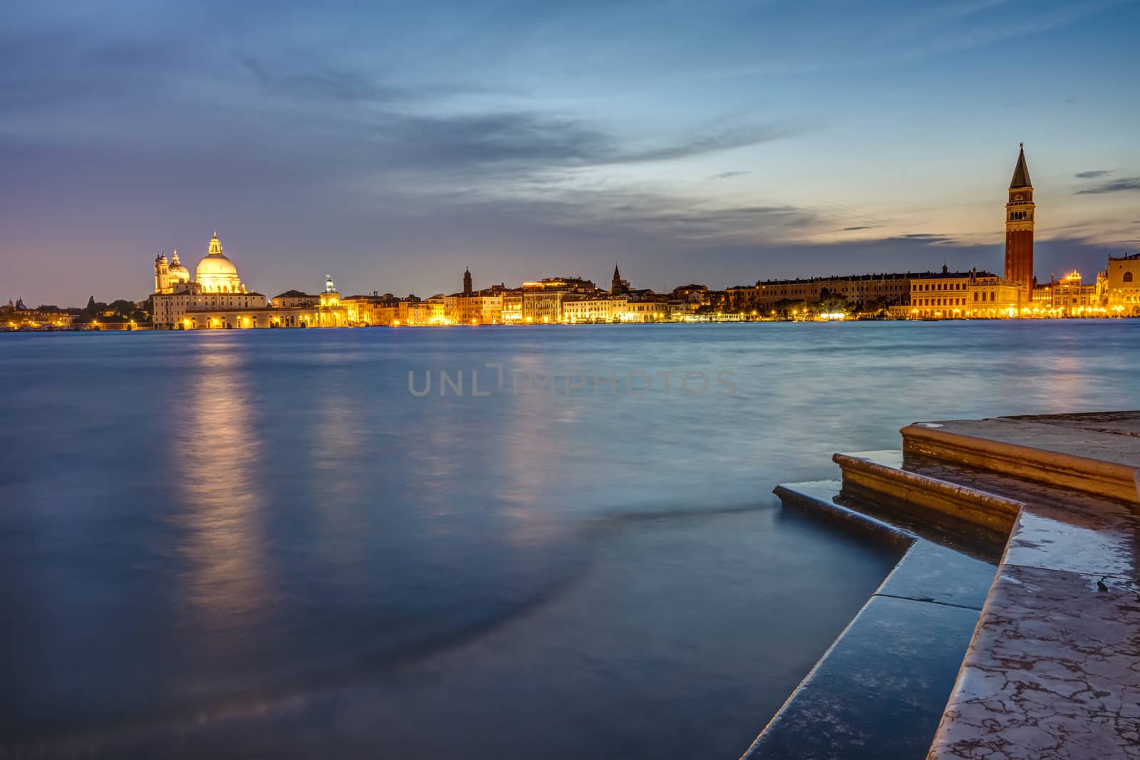 View to St Marks square and Punta della Dogana in Venice at night
