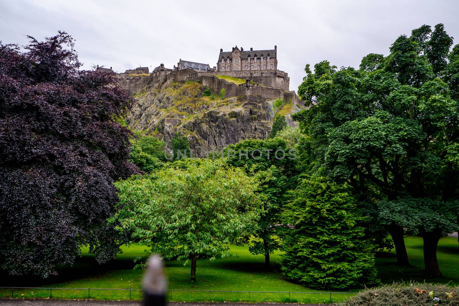 View of old Edinburgh, Scotland on a sunny day from Princes Street Gardens