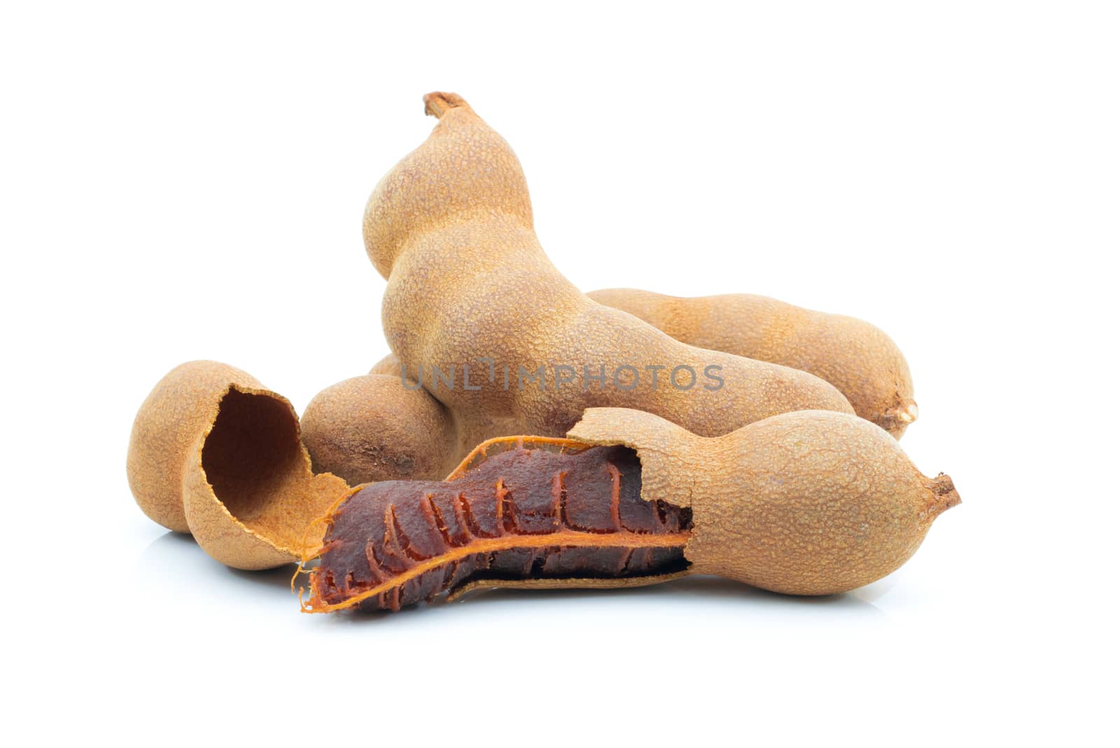 Sweet tamarind on a white background by sompongtom