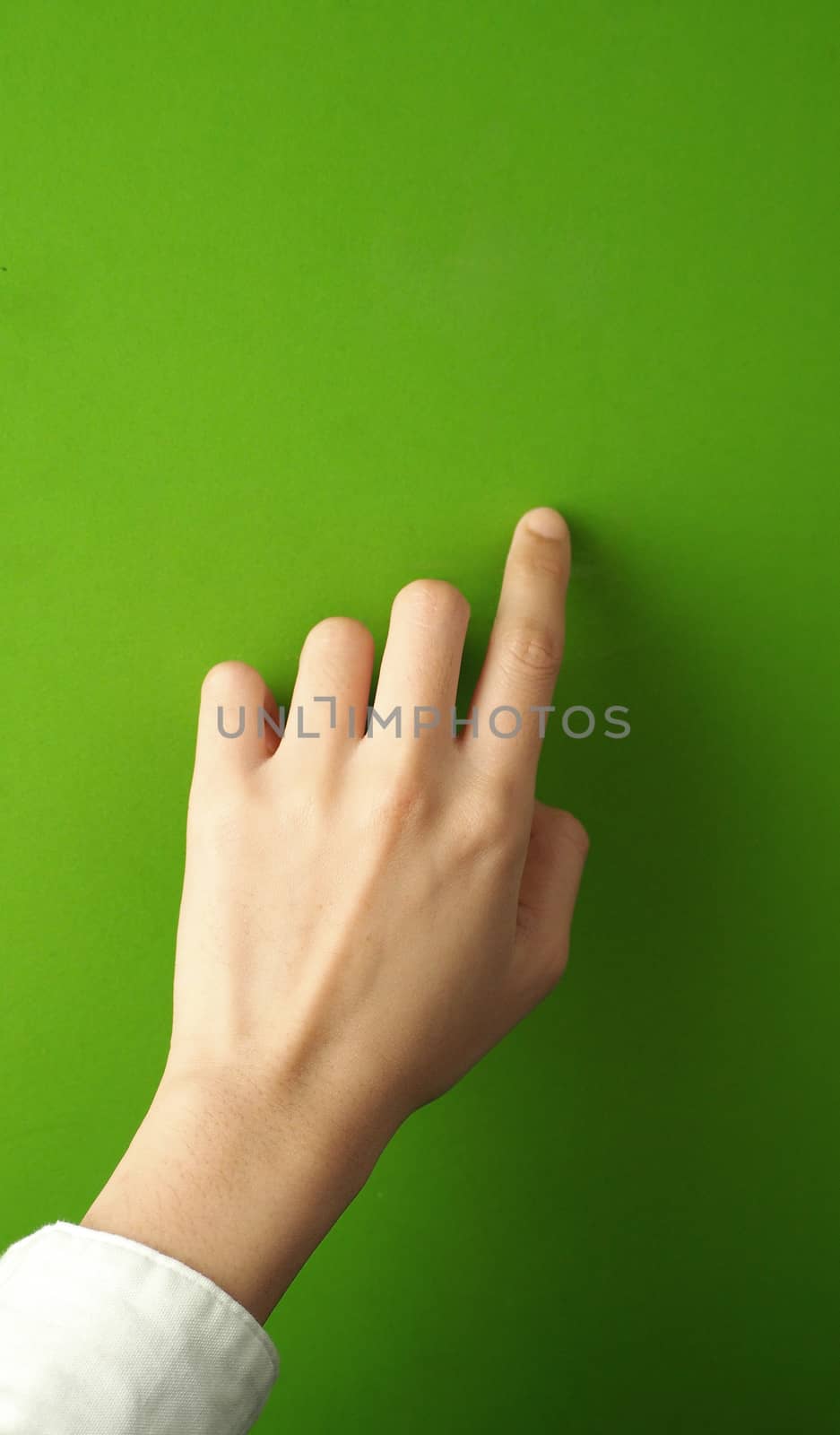 Woman finger and hand and touching on green screen background.