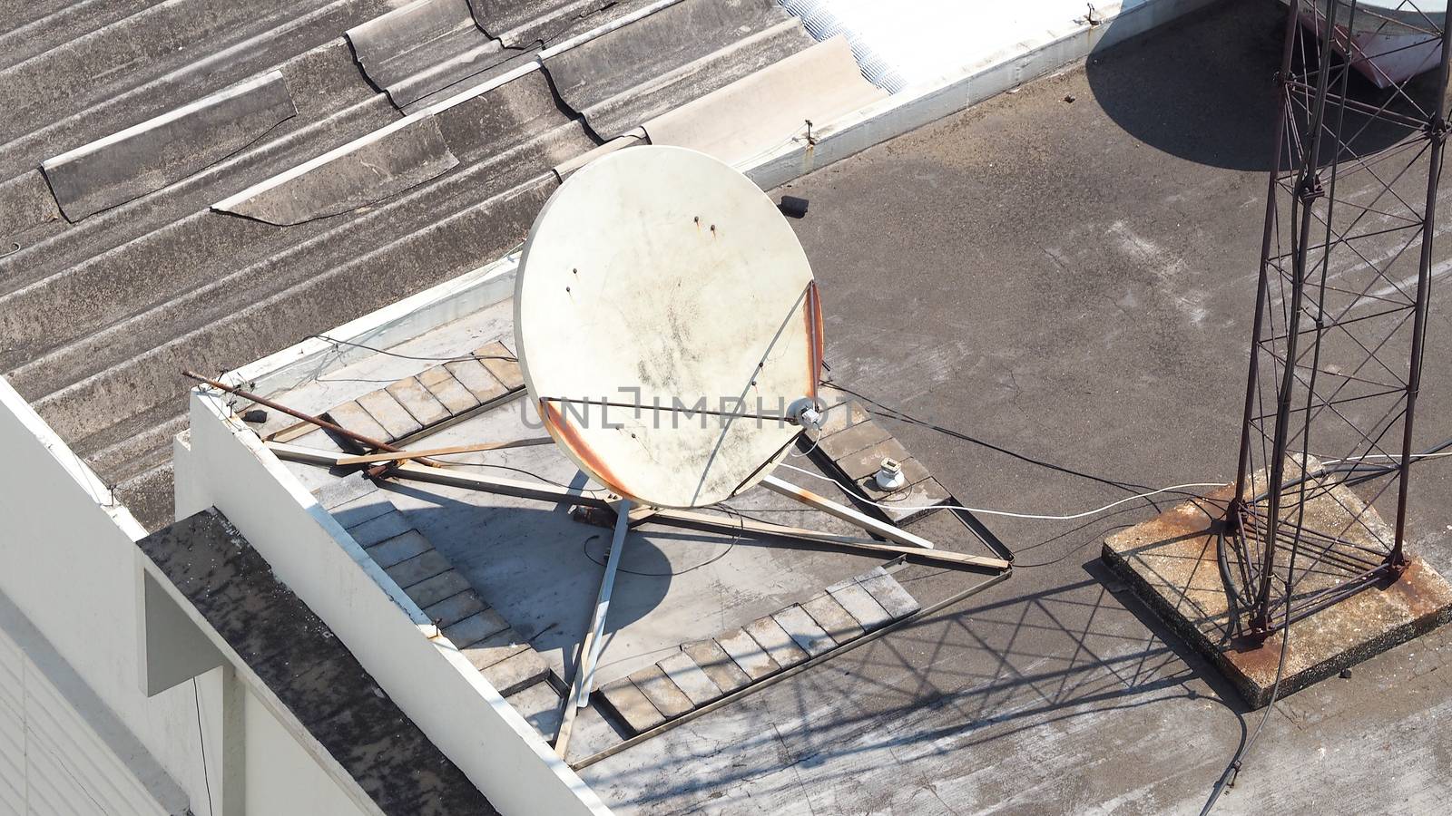 Old big telecommunication satellite dish. by gnepphoto