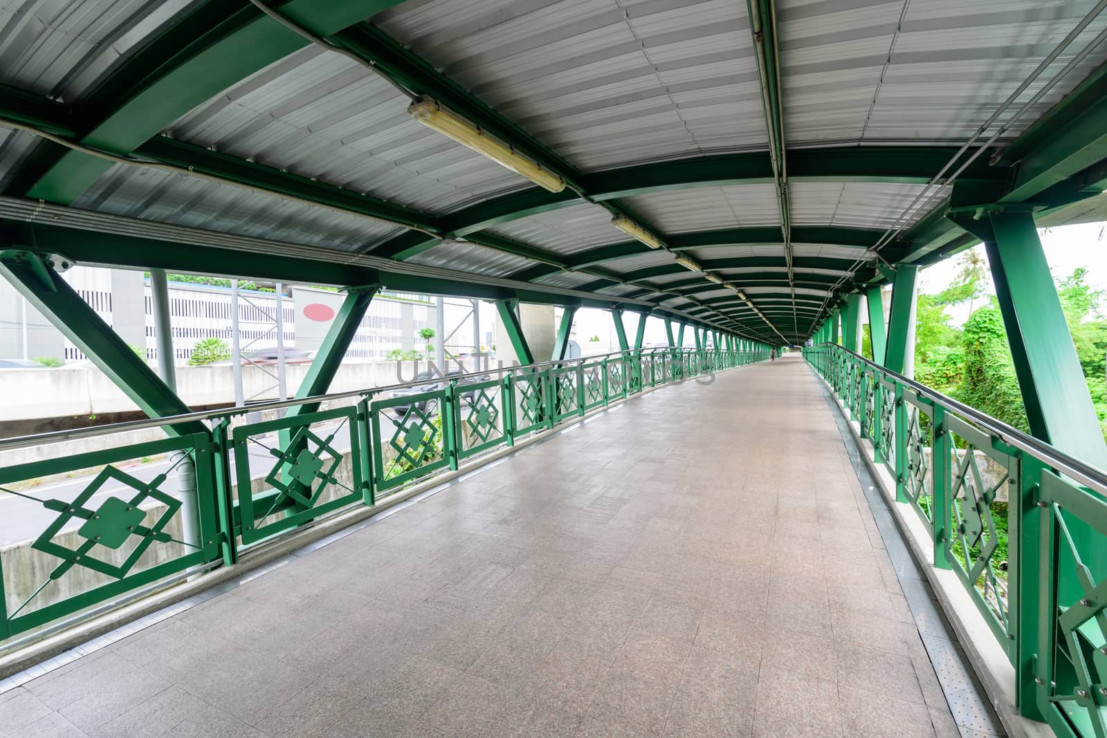 empty walkway bridge between skytrain