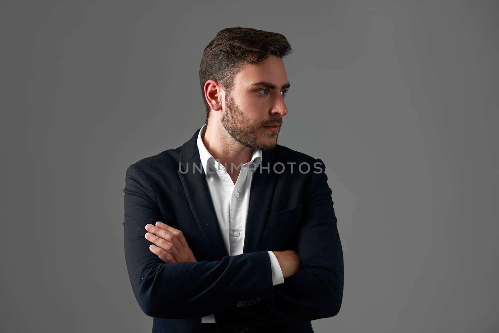 Businessman Business person. Man business suit studio gray background. Modern caucasian person arms crossed Portrait attractive successful millenial guy entrepreneur
