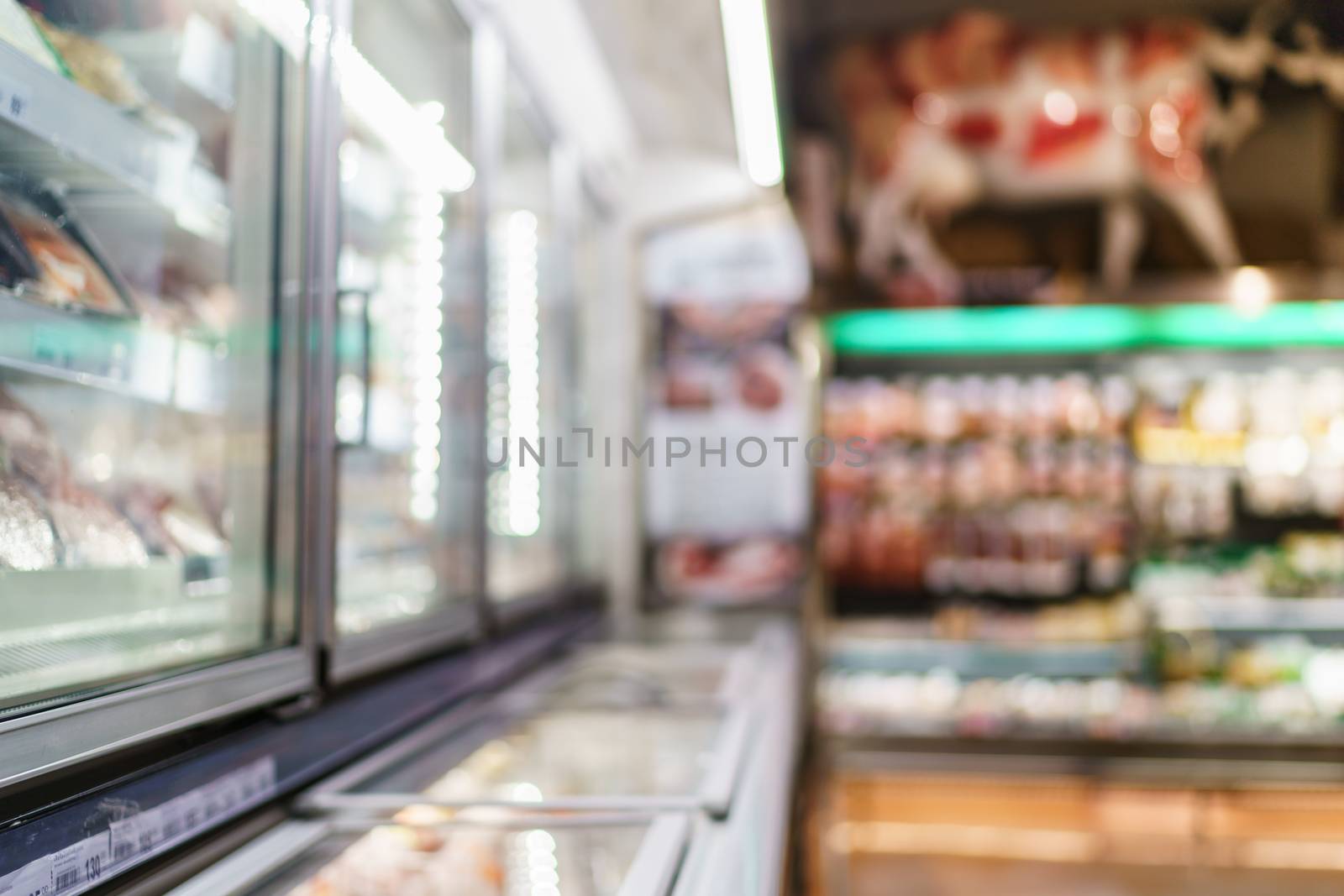 Blurred of supermarket with product shelves background image. by sirawit99