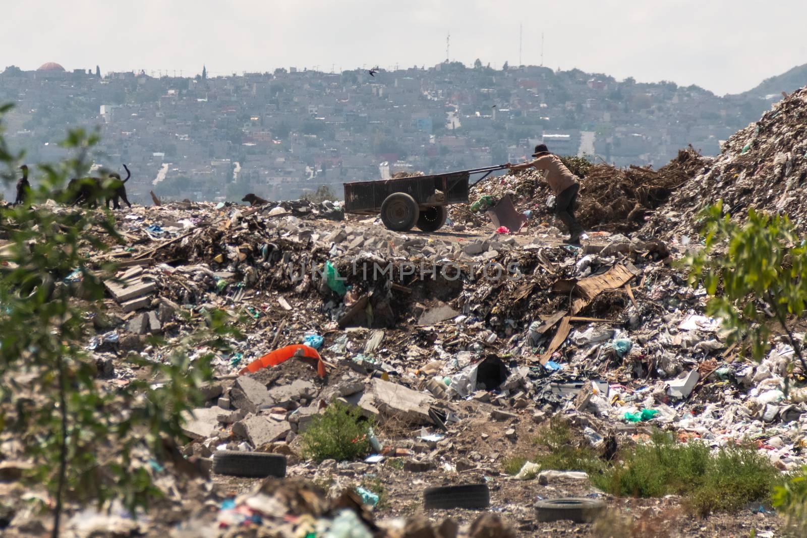 A huge landfill for waste disposal. Accumulation of garbage in landfill or deposit. Pollution concept.