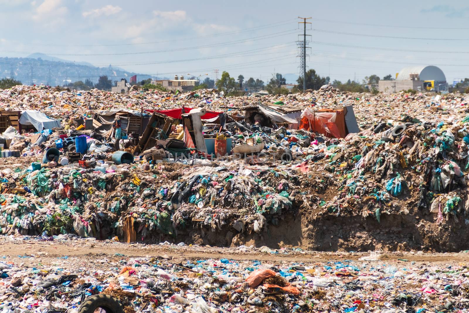 A huge landfill for waste disposal. Accumulation of garbage in landfill or deposit. Pollution concept.