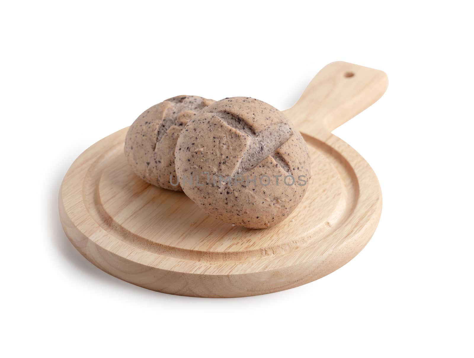 Homemade buns on the cutting board isolated on the white background with clipping paths. Bread is a food made from wheat flour mixed with water and yeast or baking powder.
