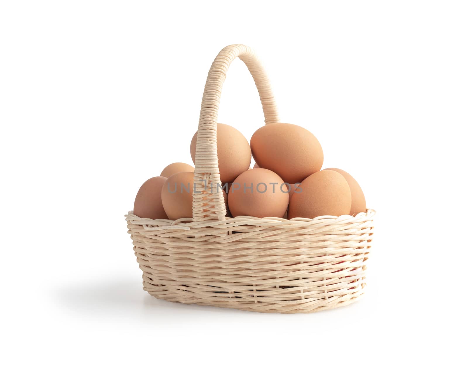 Eggs in the wooden basket on the white background by Nikkikii