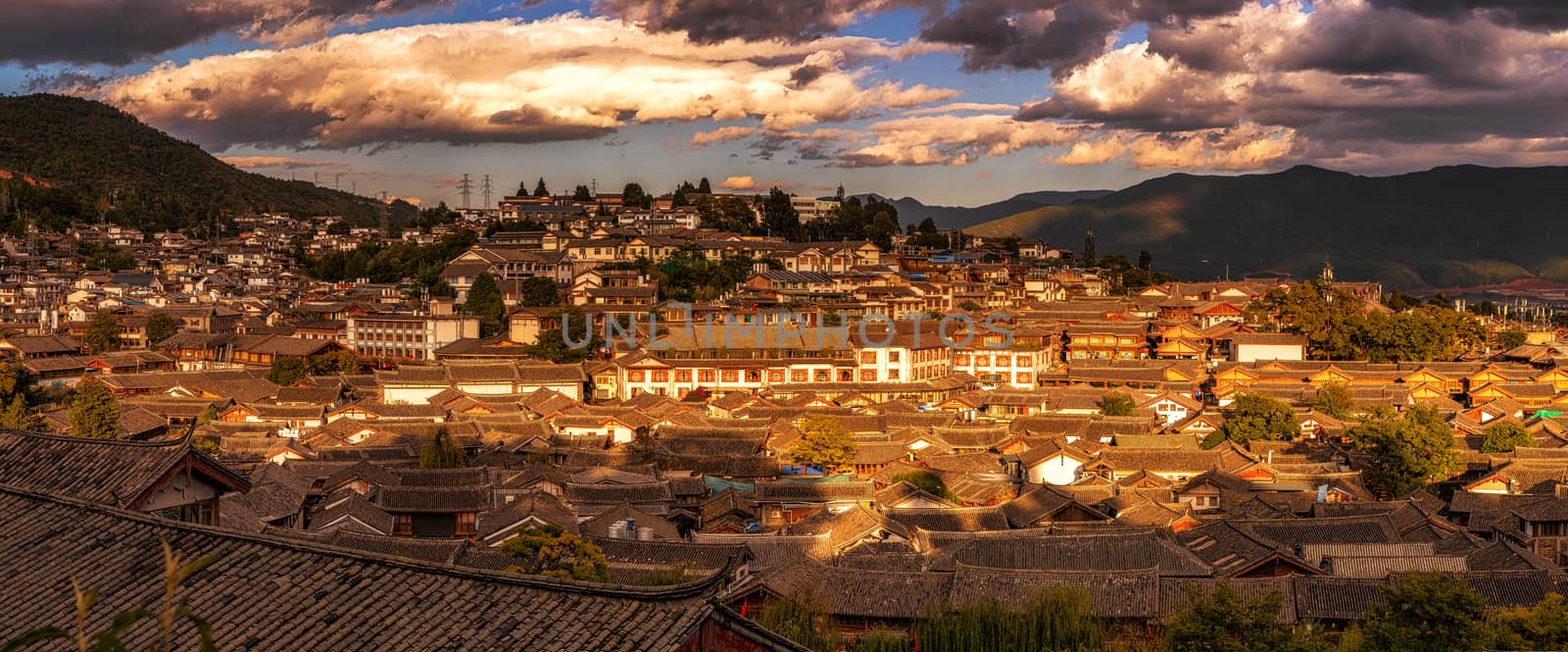 Panorama Top view scene of ancient LiJiang old town, is the historical center of Lijiang City, in Yunnan, China. It is a UNESCO World, culture and traditional, travel and tourist, holiday concept